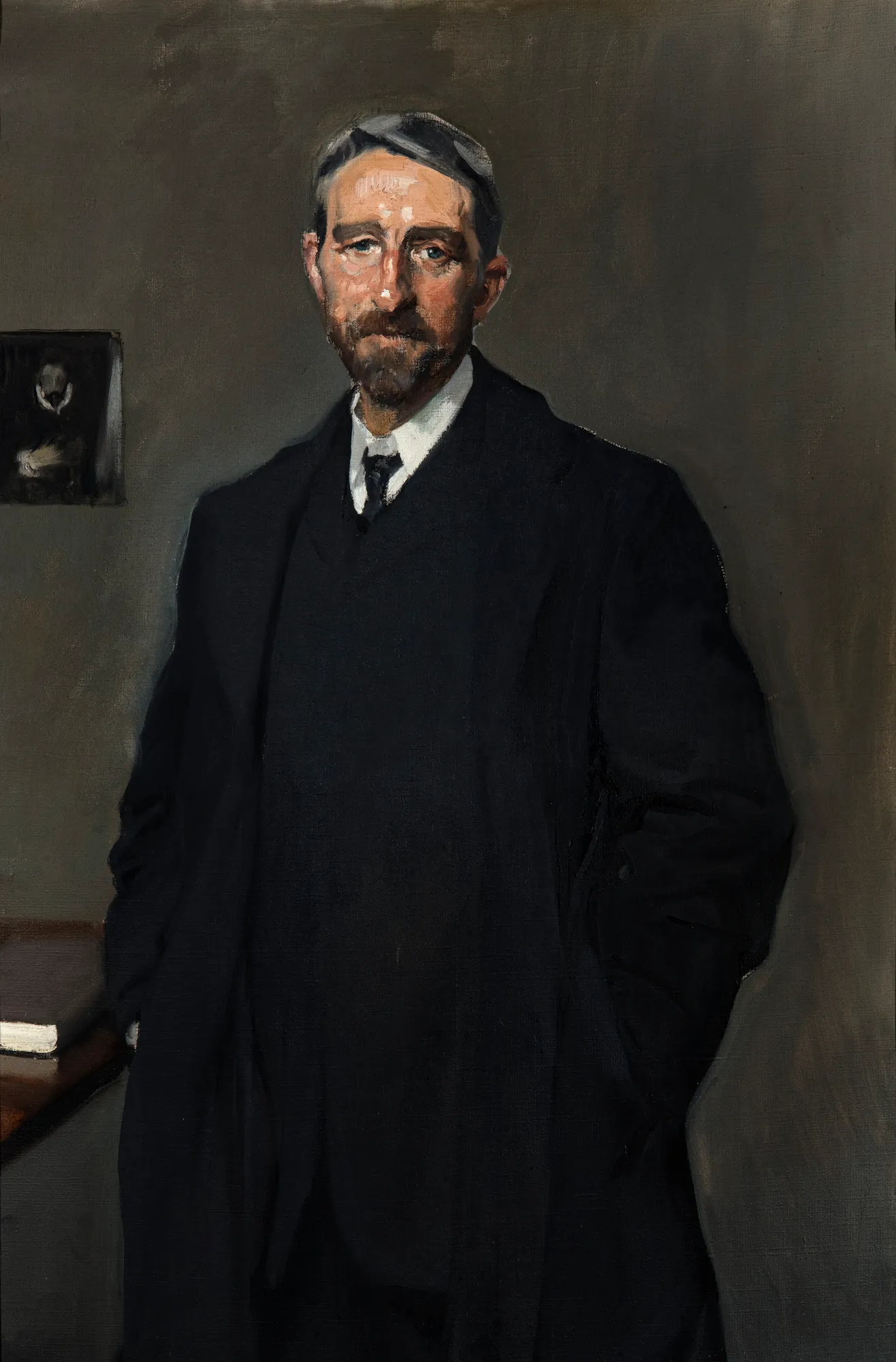 Manuel Bartolomé Cossío Manuel Bartolomé Cossío by Joaquín Sorolla. A three-quarter length portrait of a man with graying hair and a beard, wearing a heavy dark overcoat over a white shirt and black tie.