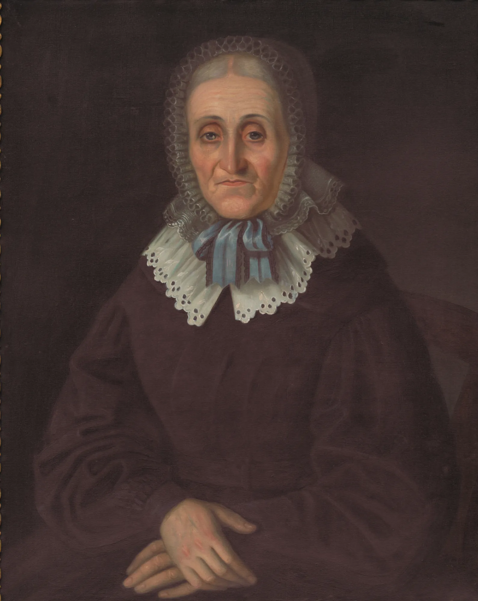 Júlia Cancrini Júlia Cancrini by Peter Michal Bohúň. A portrait of an elderly woman seated with her hands crossed, wearing a dark dress with a prominent white lace collar and a matching bonnet.