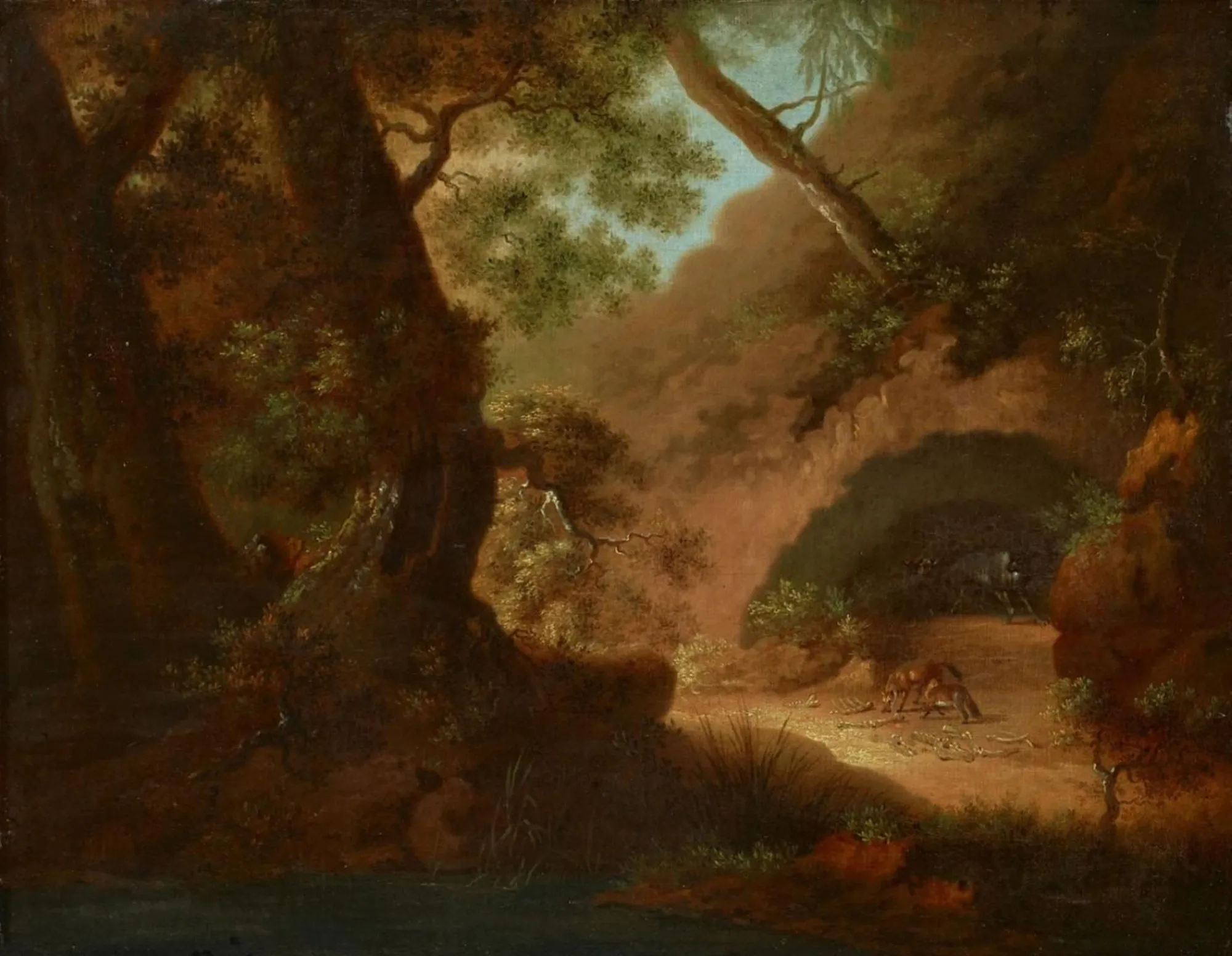 Wolves in a Forest in Front of a Cave