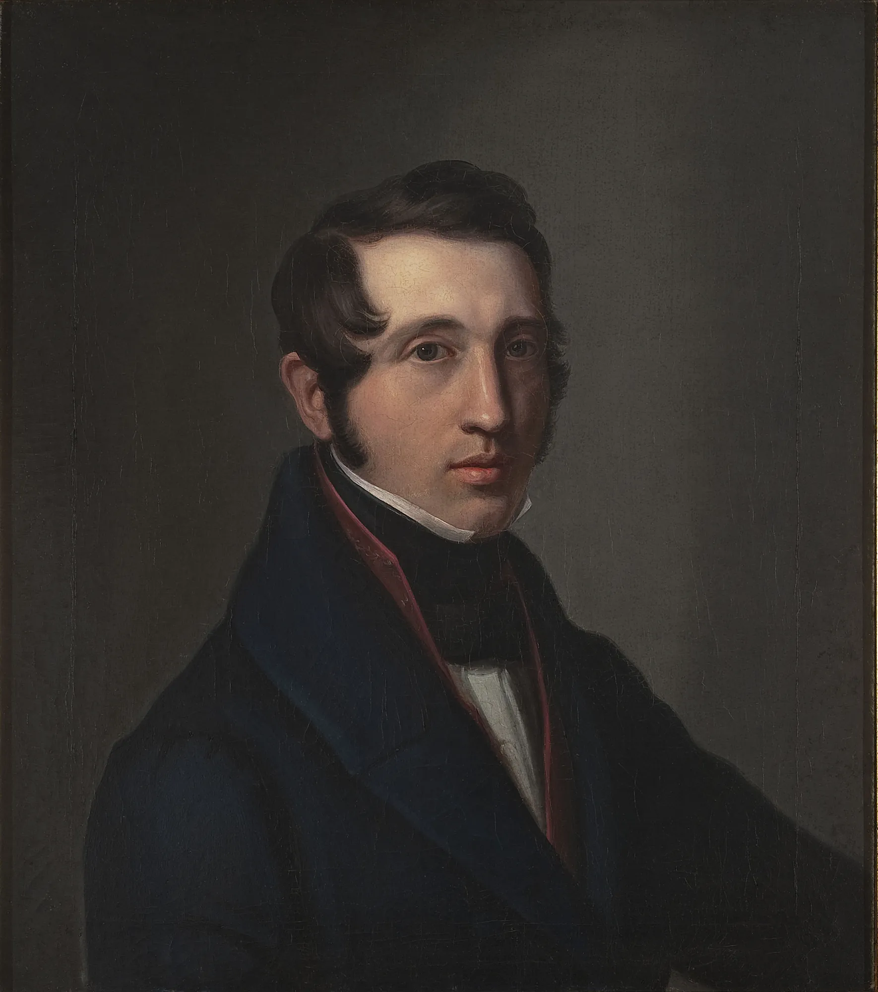 Portrait of Count Karol Krasiński Portrait of Count Karol Krasiński by Unknown Artist. A waist-up oil portrait of a dark-haired man in a navy coat and high collar against a dark, neutral background.