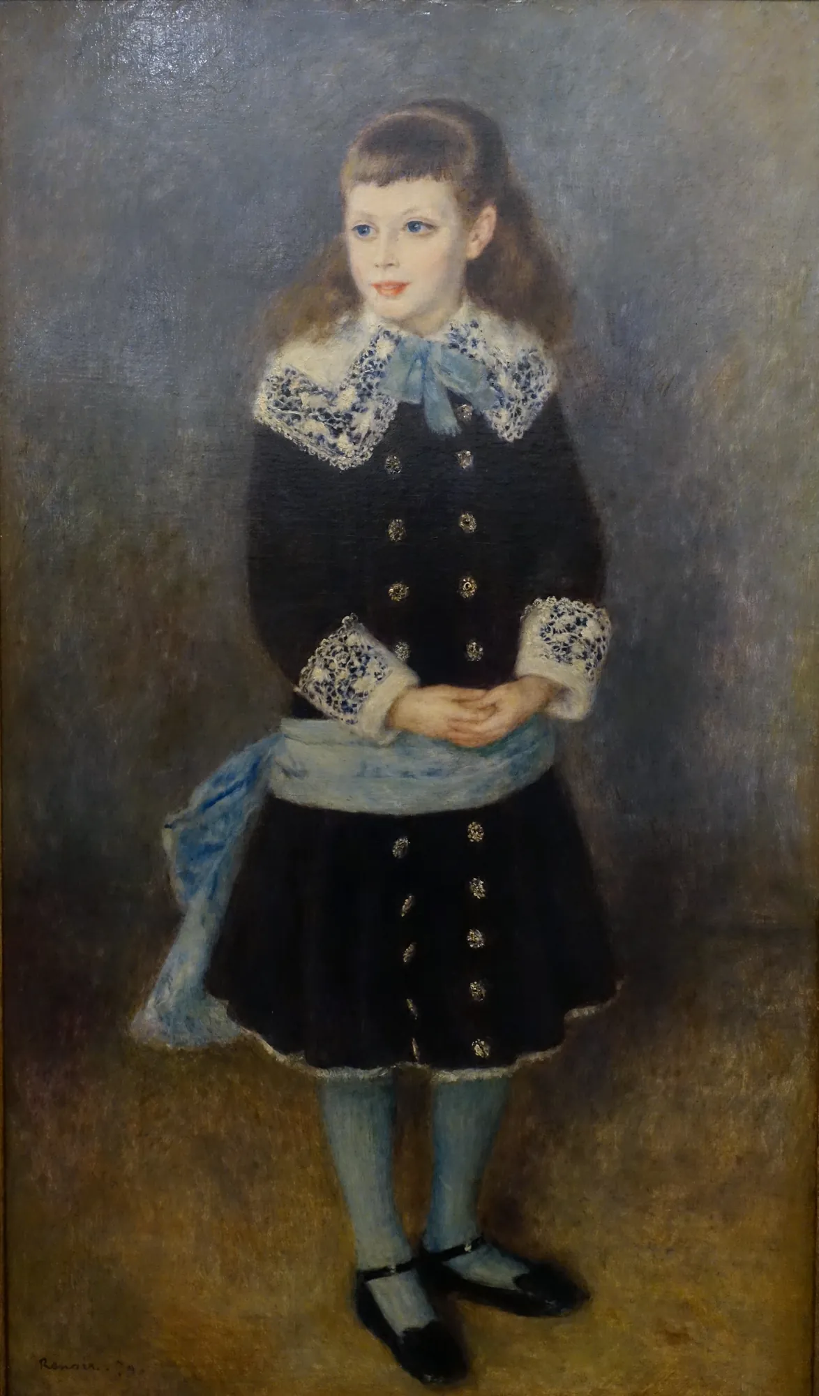Marthe Bérard Marthe Bérard by Pierre-Auguste Renoir. A full-length Impressionist portrait of a young girl standing in a dark coat with an intricate lace collar and a pale blue sash.
