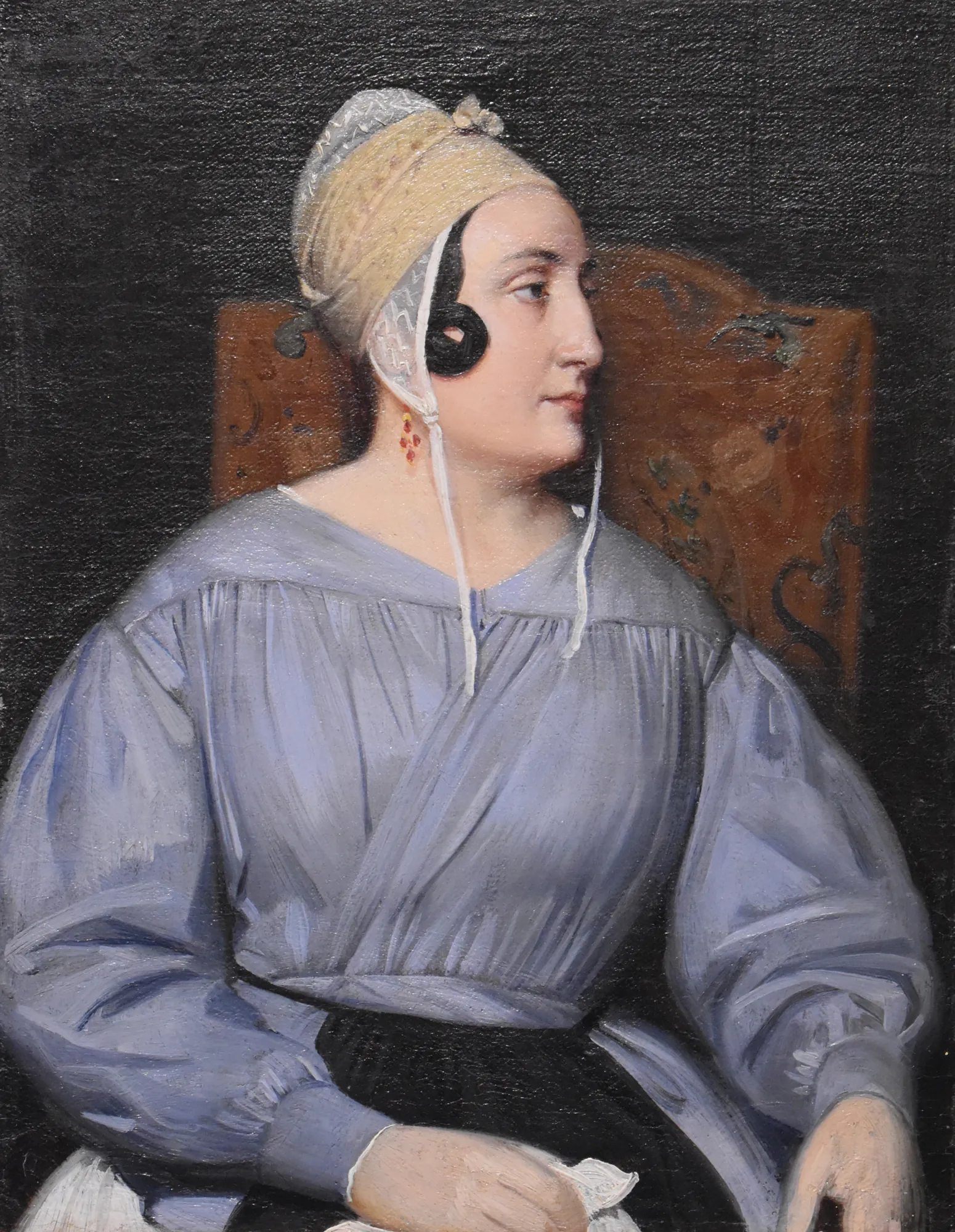 Portrait of Elisabeth Grange Portrait of Elisabeth Grange by Alexandre Hesse. A profile portrait of a woman in a blue pleated dress and an elaborate lace bonnet, seated against a dark, textured background.
