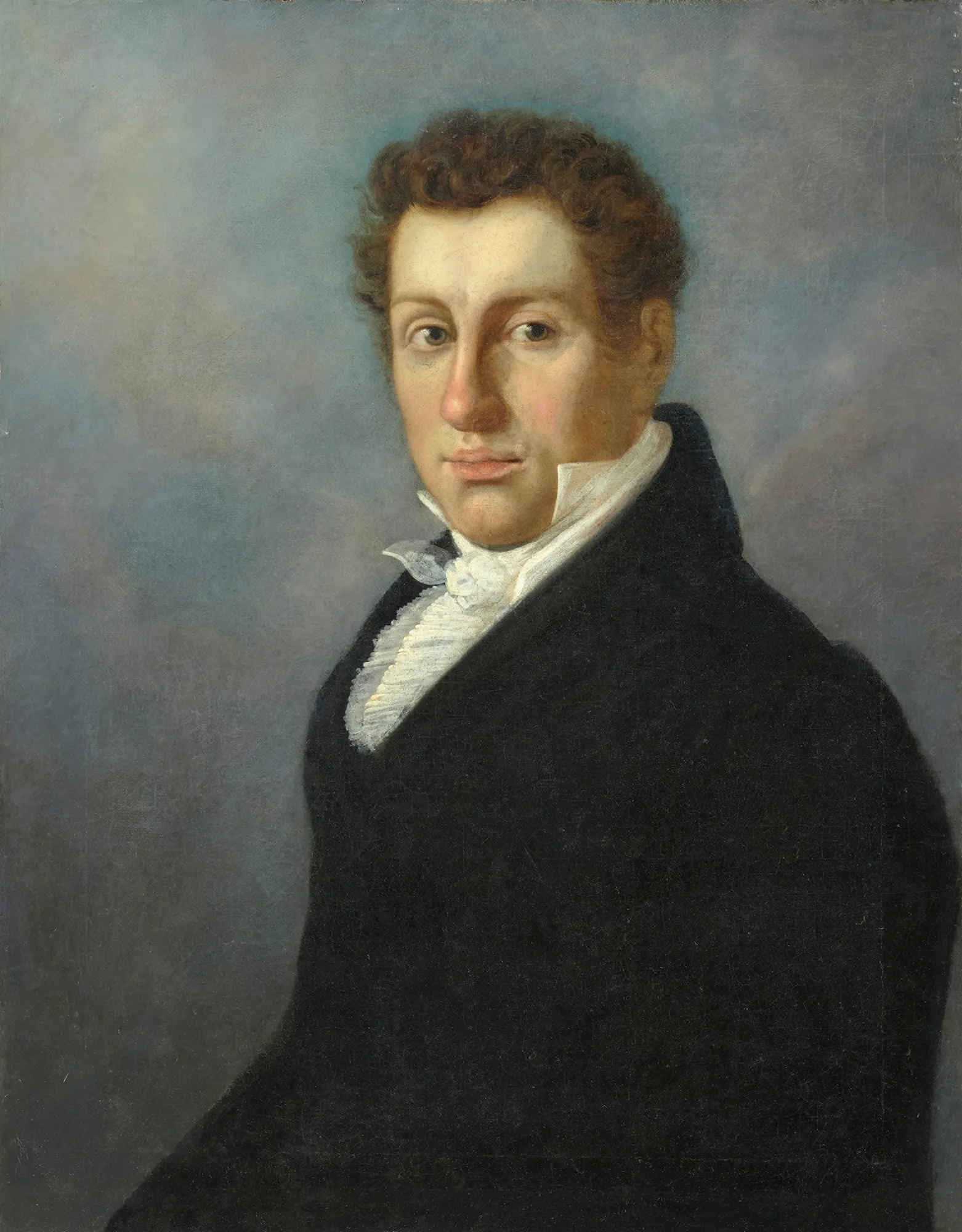 Portrait of Jarociński Portrait of Jarociński by Aleksander Kokular. A three-quarter portrait of a young man with curly hair, wearing a dark high-collared coat and ruffled white cravat against a textured blue-grey background.