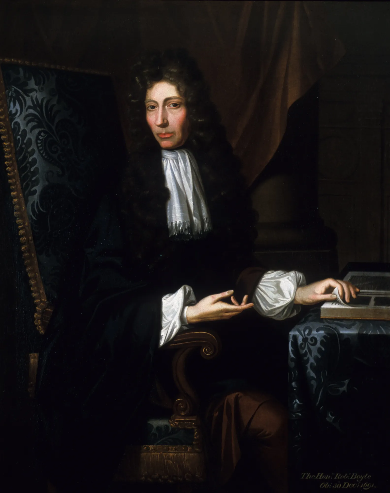 The Shannon Portrait of Robert Boyle The Shannon Portrait of Robert Boyle by Johann Kerseboom. A formal three-quarter length portrait of a man in dark robes and a white cravat, seated at a table with an open book.