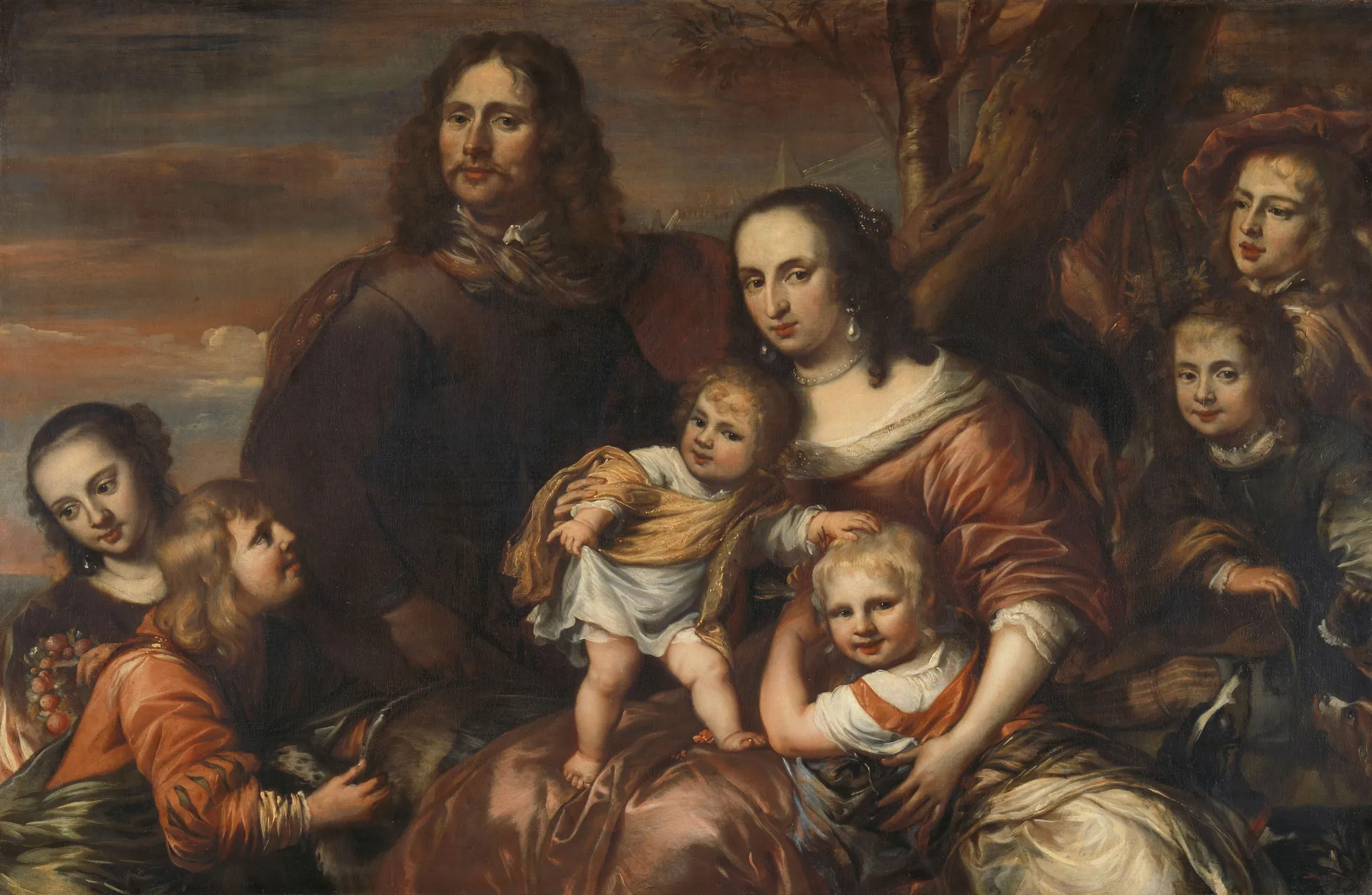 A Couple with Six Children A Couple with Six Children by Jürgen Ovens. A large-scale 17th-century group portrait of a family, featuring a father, mother, and their six children in an atmospheric outdoor setting.