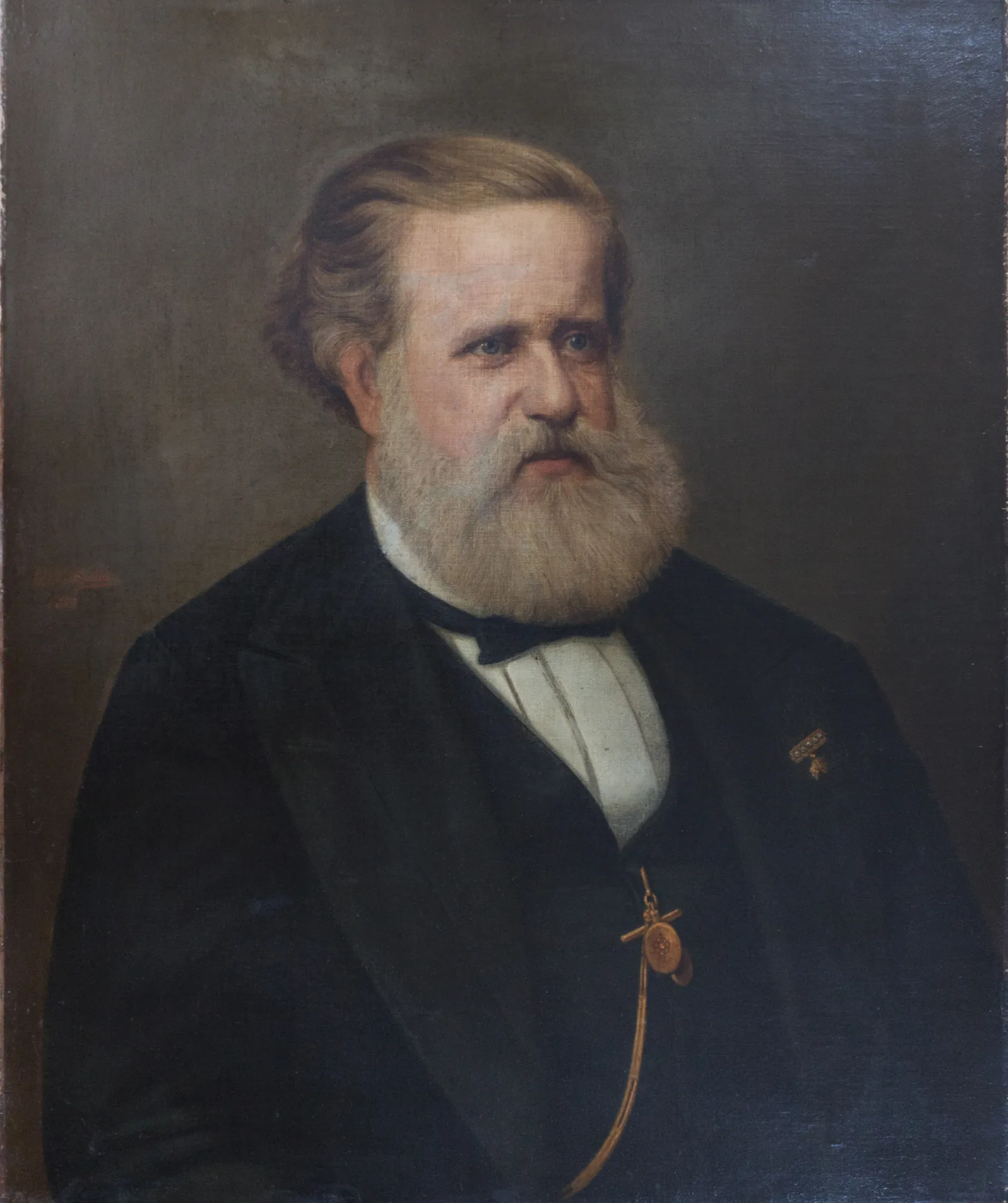 Portrait of Dom Pedro II Portrait of Dom Pedro II by Vicente Mallio. A formal half-length oil portrait of an elderly man with a prominent grey beard, wearing a dark suit and a white shirt with a bow tie.