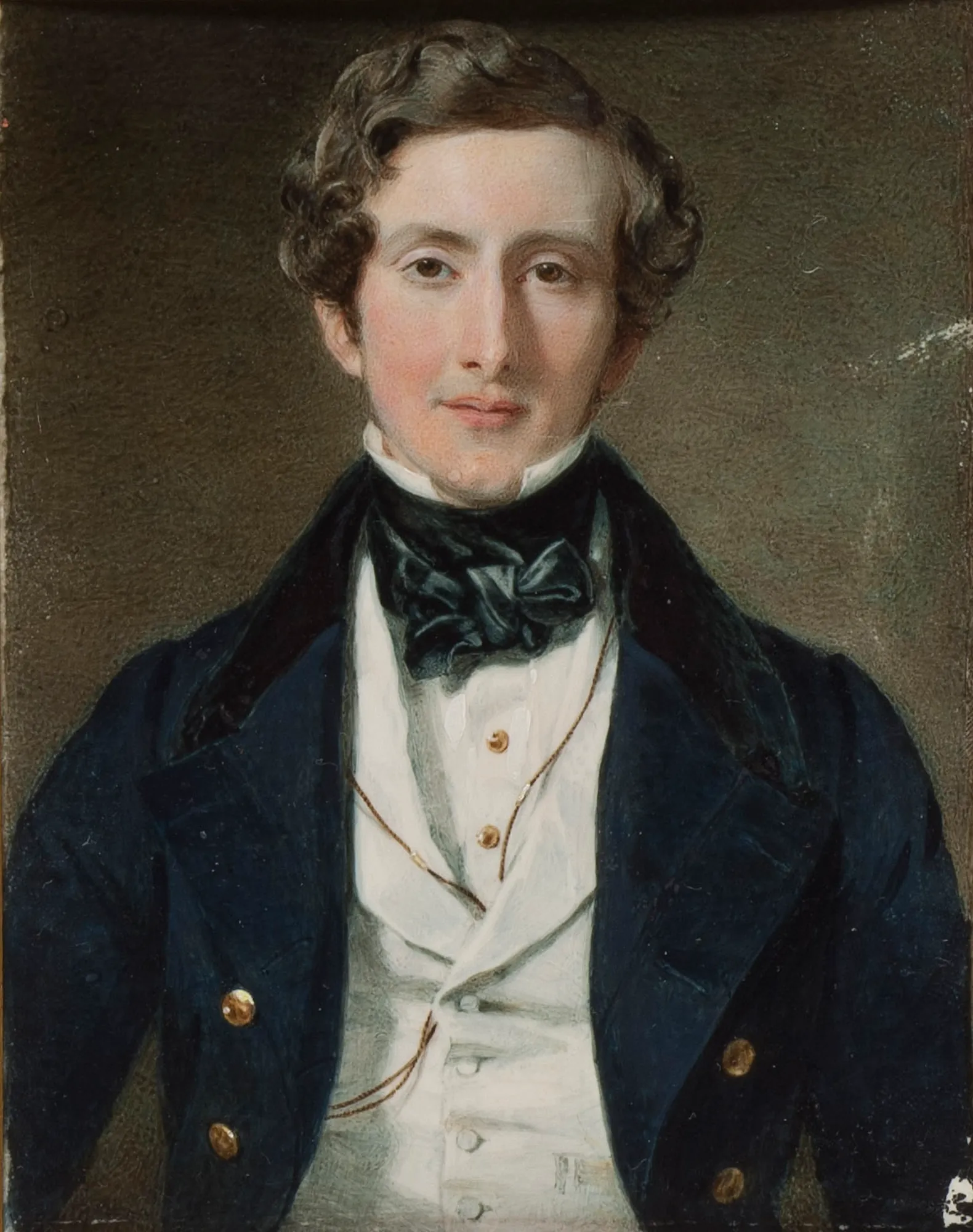 Portrait of a Man Portrait of a Man by William Charles Ross. A waist-length miniature portrait of a young man with dark wavy hair, dressed in a dark blue coat and white waistcoat.