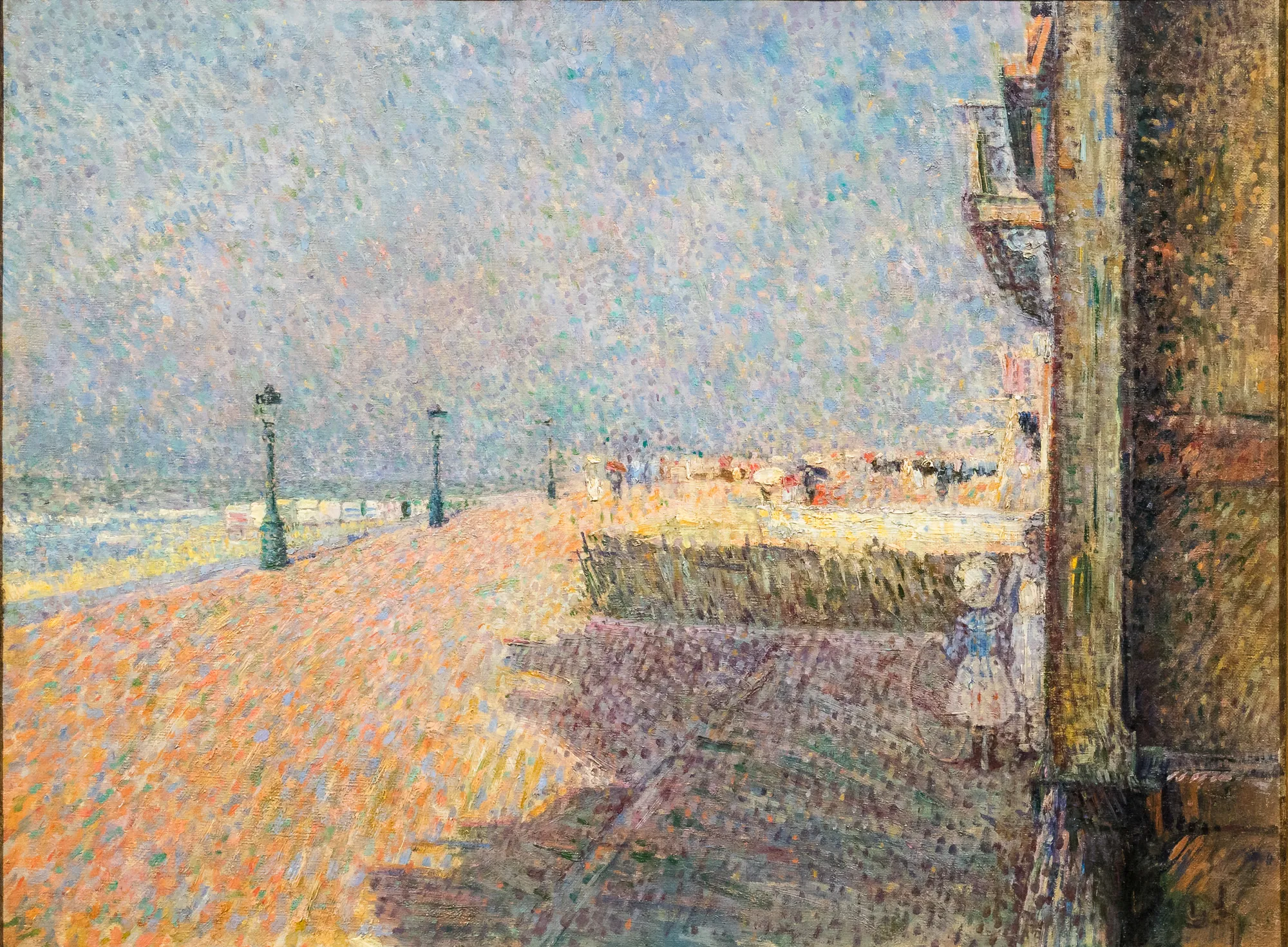 Sur la digue (La plage à Ostende) Sur la digue (La plage à Ostende) by Georges Lemmen. A neo-impressionist pointillist landscape depicting a sun-drenched beach promenade with lampposts and a large building edge on the right.