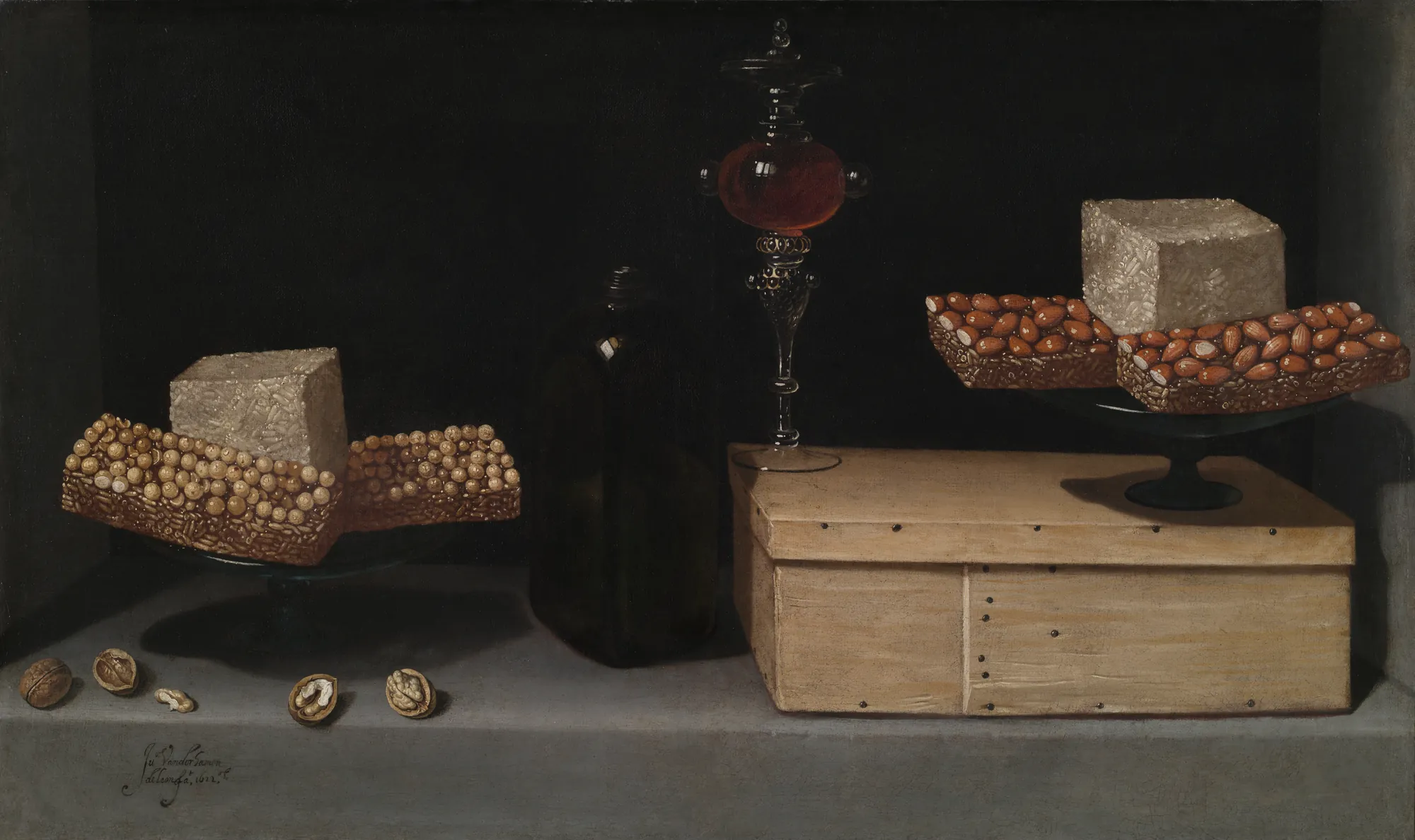 Still Life with Sweets Still Life with Sweets by Juan van der Hamen. A meticulously arranged still life on a stone ledge featuring boxes of sweets, a glass of wine, and scattered walnuts against a dark, shadowy background.