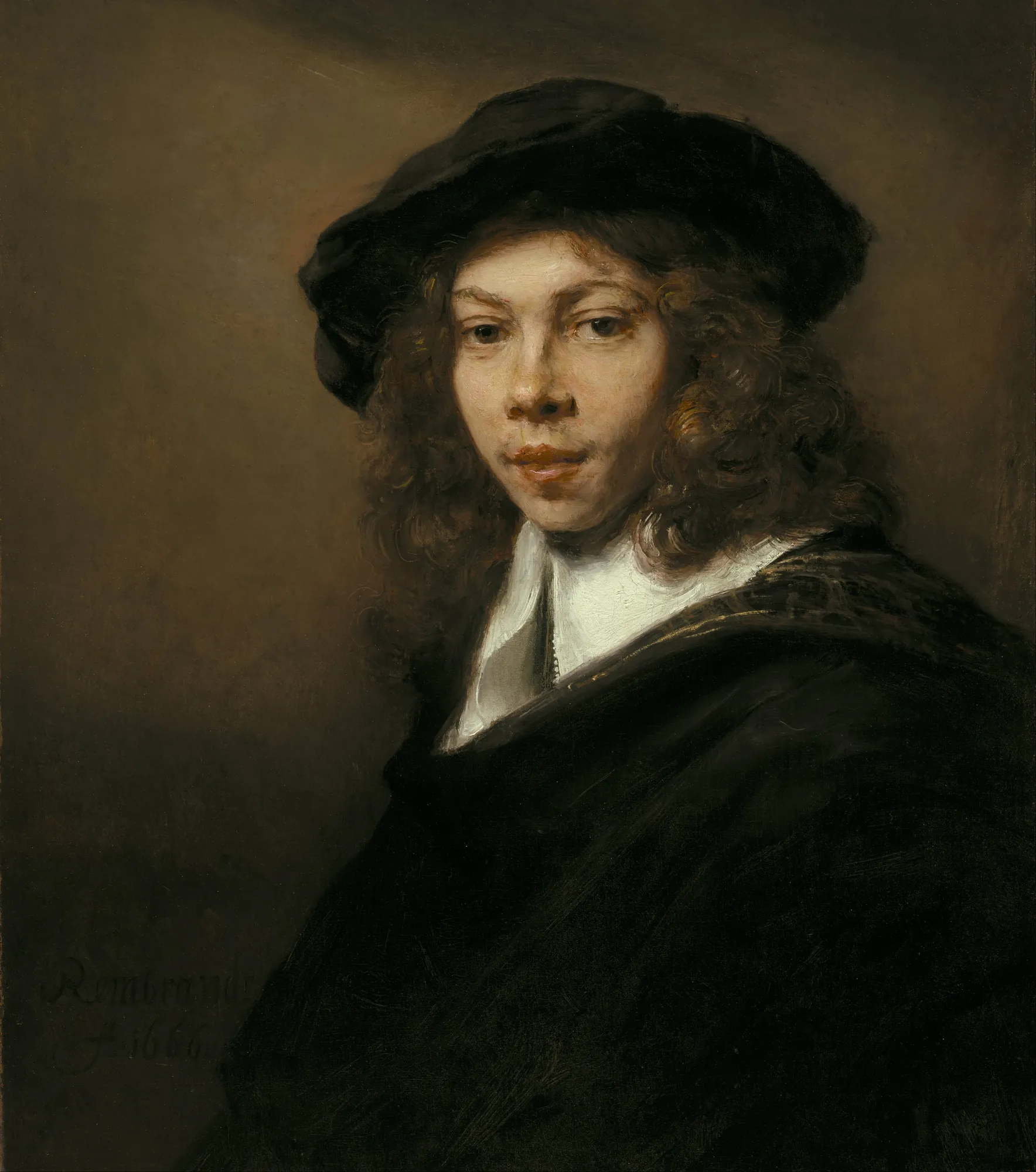 Youth with a Black Cap Youth with a Black Cap by Rembrandt. A portrait of a young man with shoulder-length curly hair wearing a black beret and a dark cloak with a visible white collar.