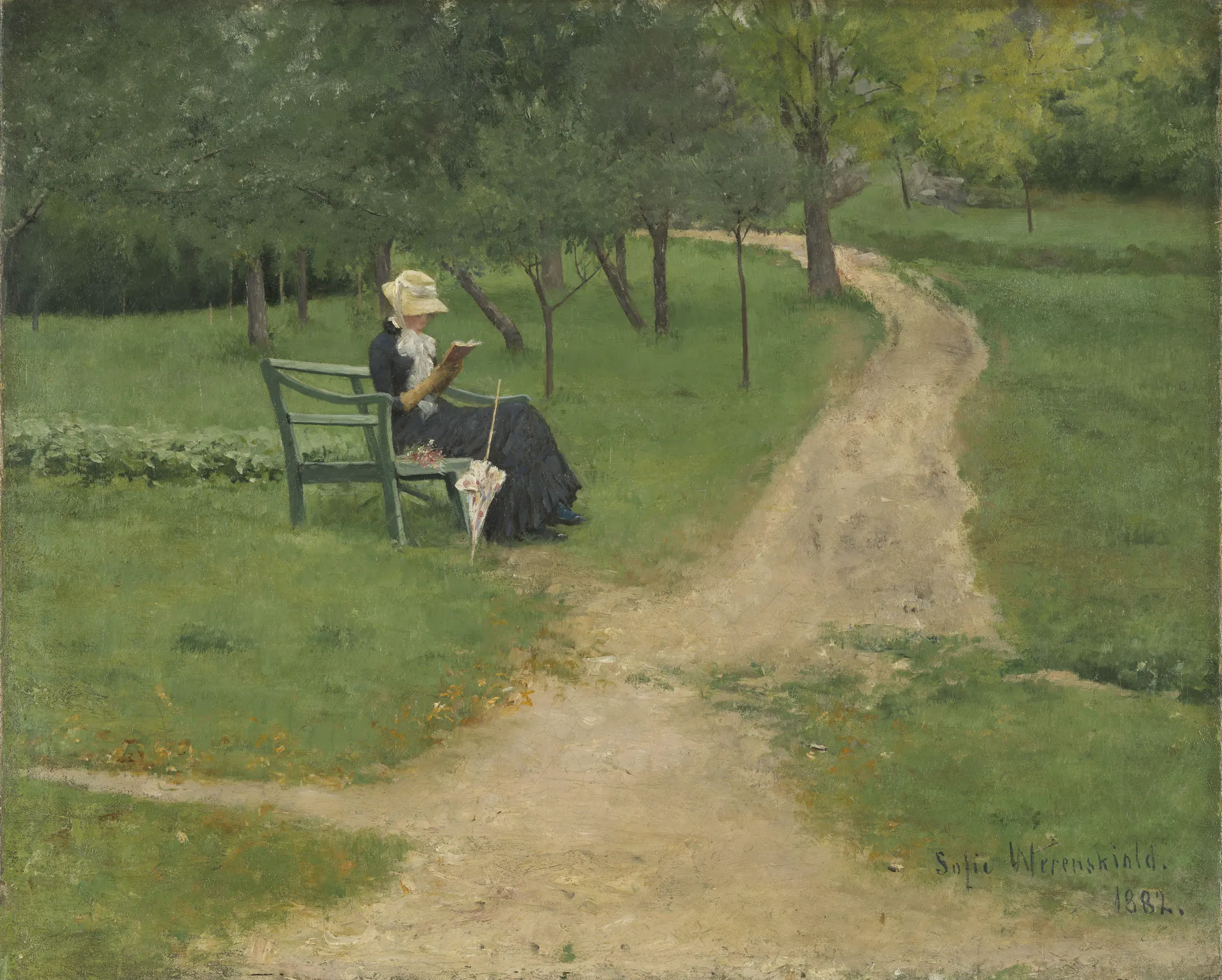 Woman Reading on a Garden Bench