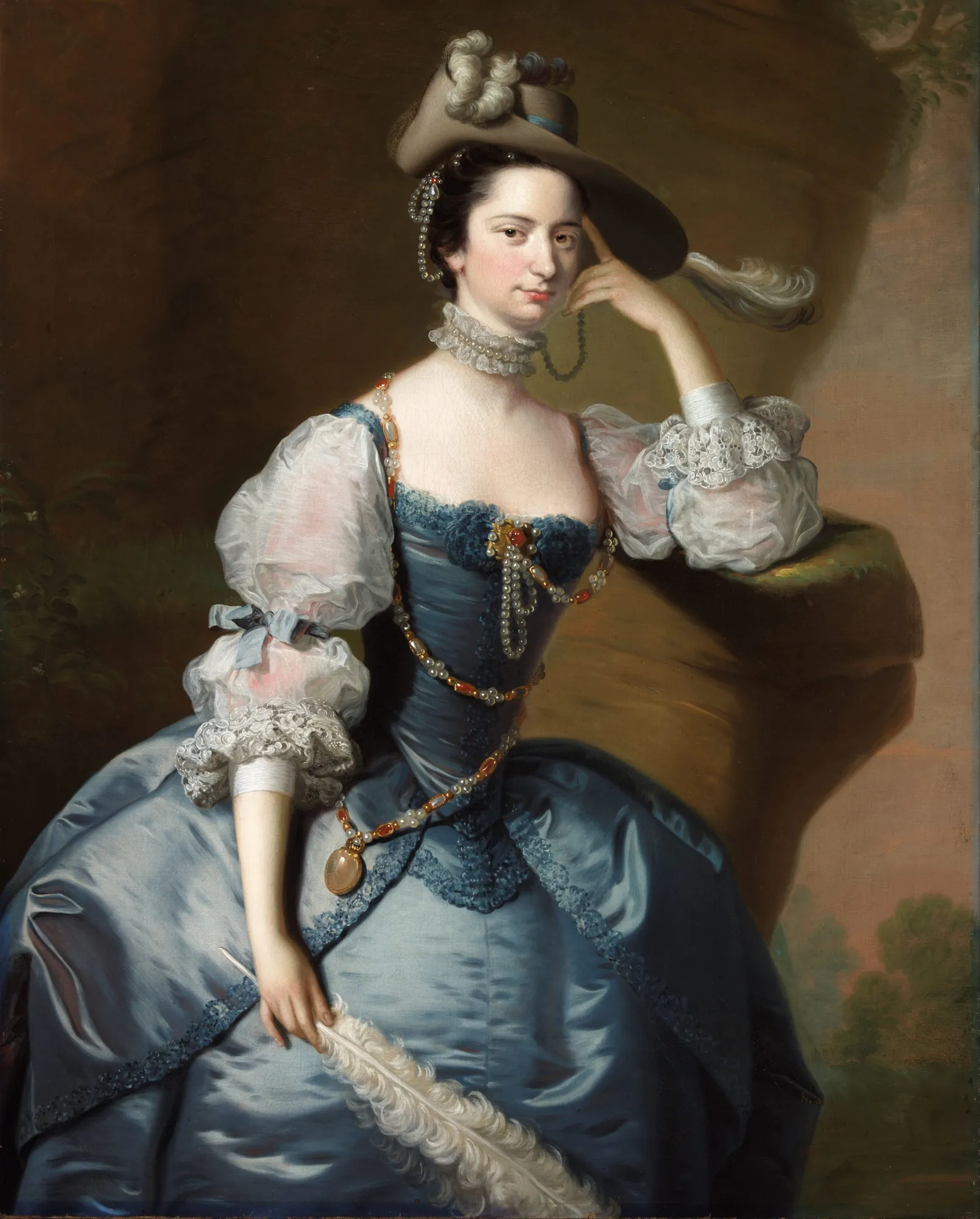 Lady Oxenden Lady Oxenden by Joseph Wright of Derby. A three-quarter length oil portrait of a woman wearing a blue satin gown and a feathered hat, posed against a dark background.