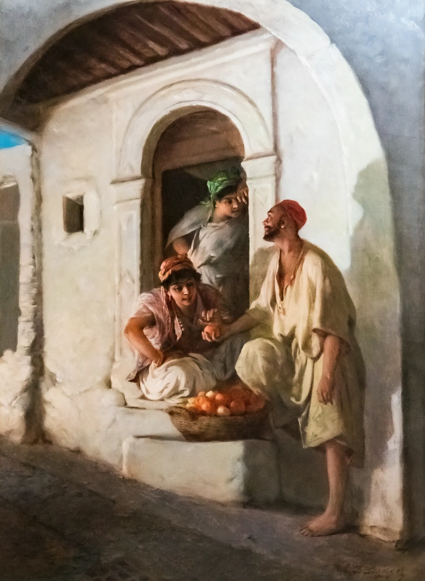 Marchand d'oranges dans une ruelle d'Orient