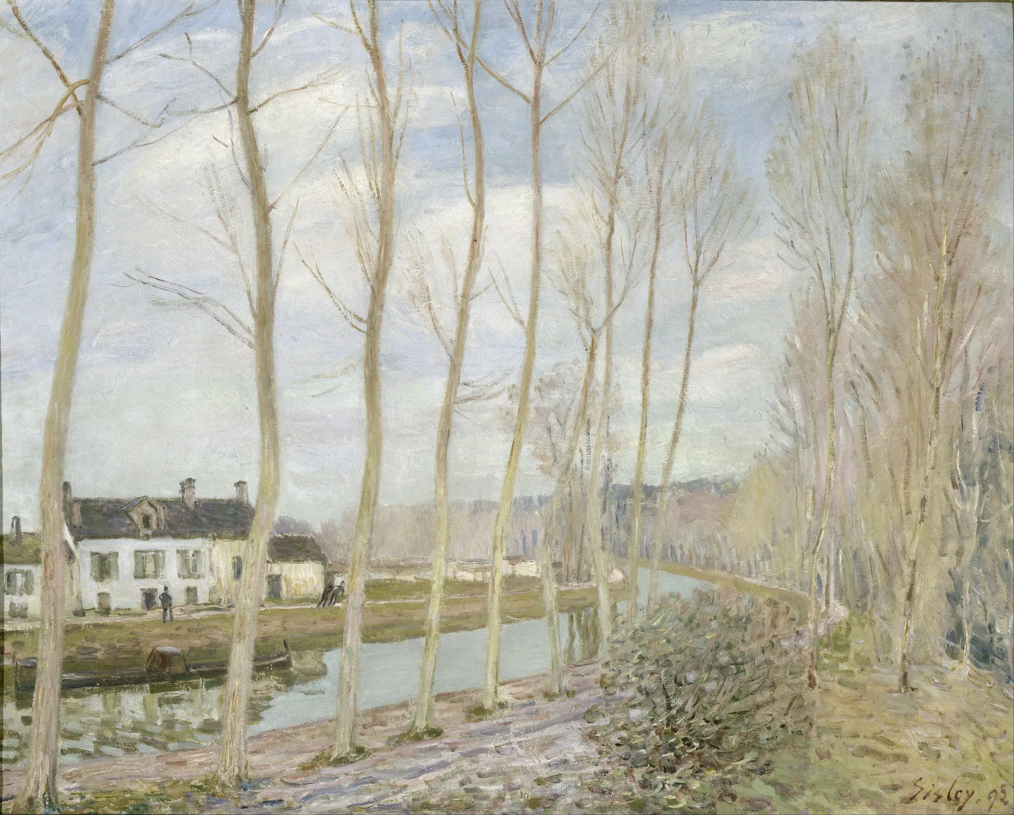 The Canal du Loing at Moret The Canal du Loing at Moret by Alfred Sisley. A line of tall, slender bare trees stands along the edge of a canal near a white house under a pale sky.