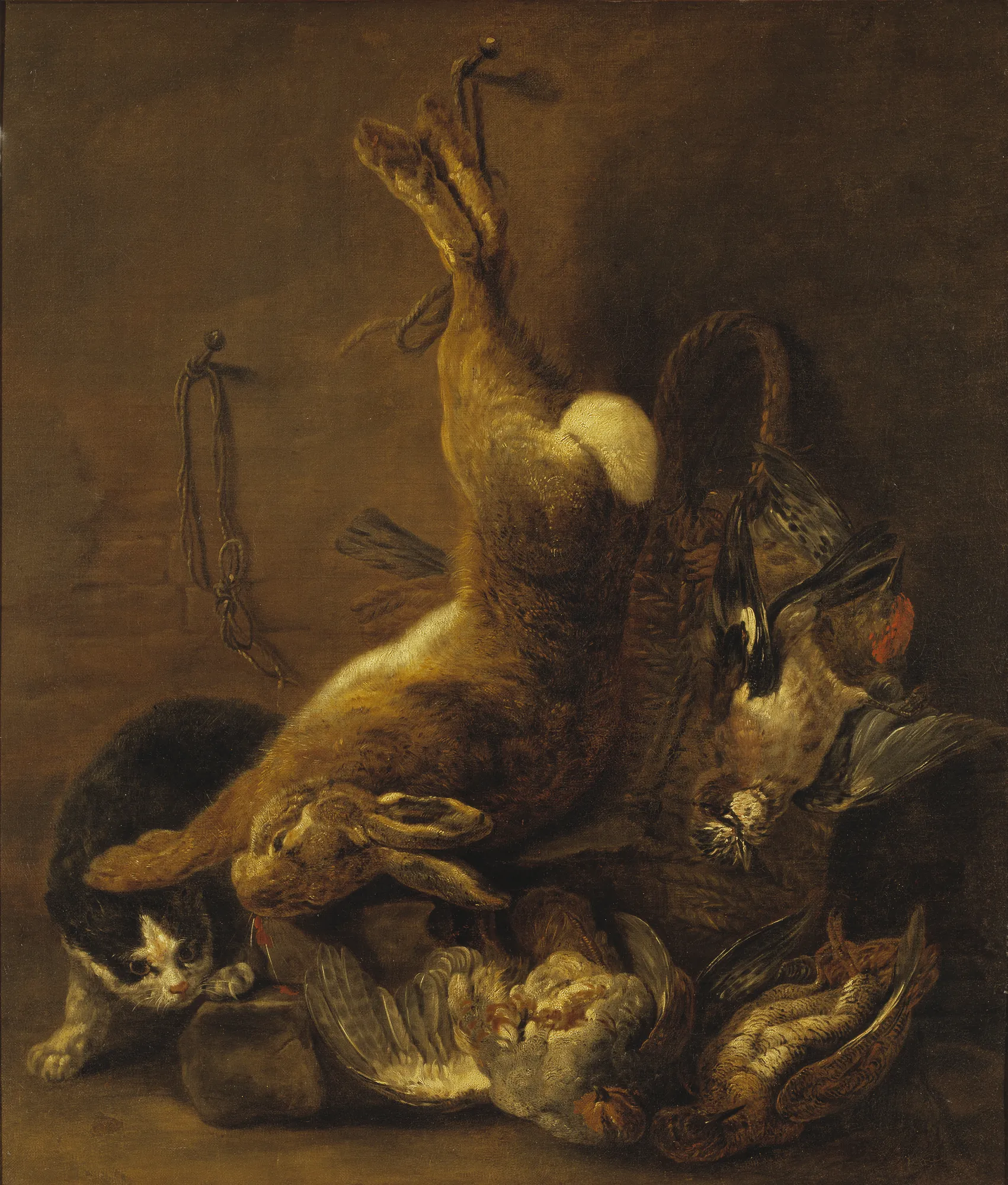 Cat and Still Life with Game Cat and Still Life with Game by Jan Fyt. A black and white cat lurks beside a hanging hare and a basket of game birds against a dark, atmospheric background.