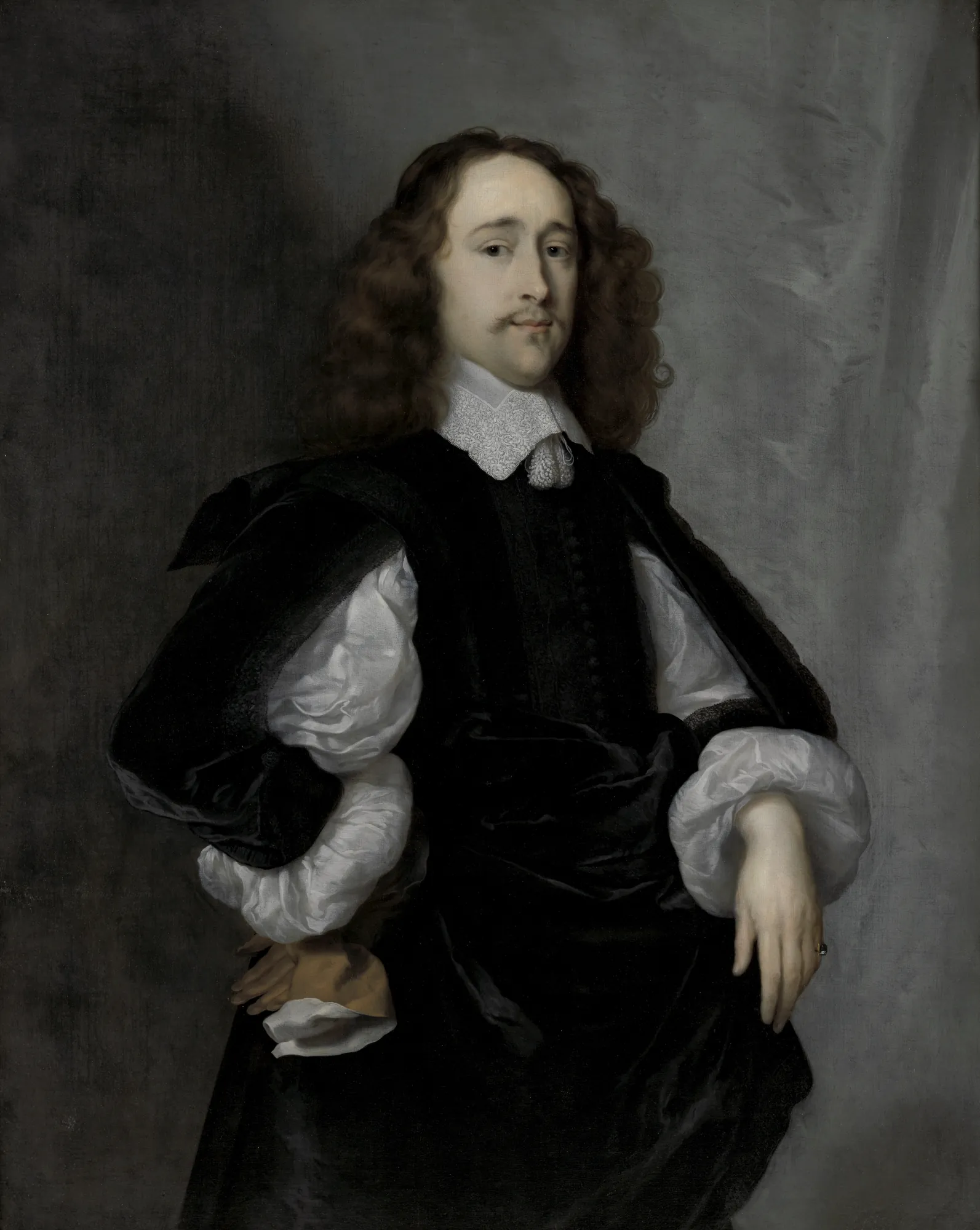 Portrait of Jasper Schade Portrait of Jasper Schade by Cornelis Janssens van Ceulen. A three-quarter length portrait of a man with long curly brown hair, wearing a black doublet with white slashed sleeves and a fine lace collar.