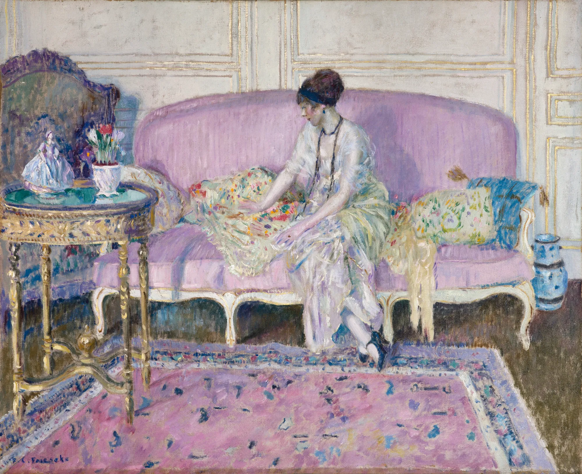 Woman Seated on Sofa in Interior