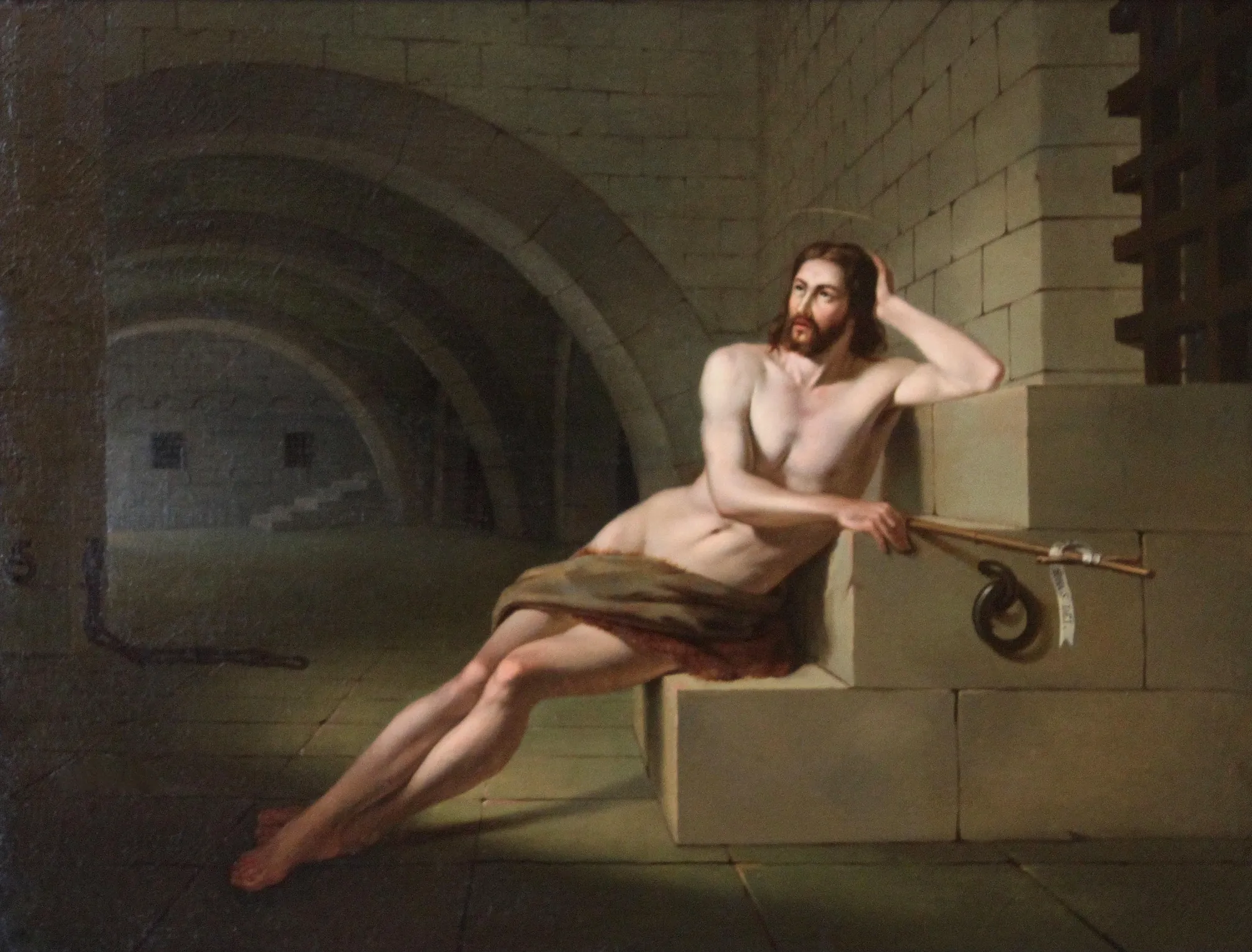 Saint John the Baptist in Prison Saint John the Baptist in Prison by Victor Meirelles. A bearded man wearing a loincloth reclines against large stone blocks in a dark, vaulted prison setting.