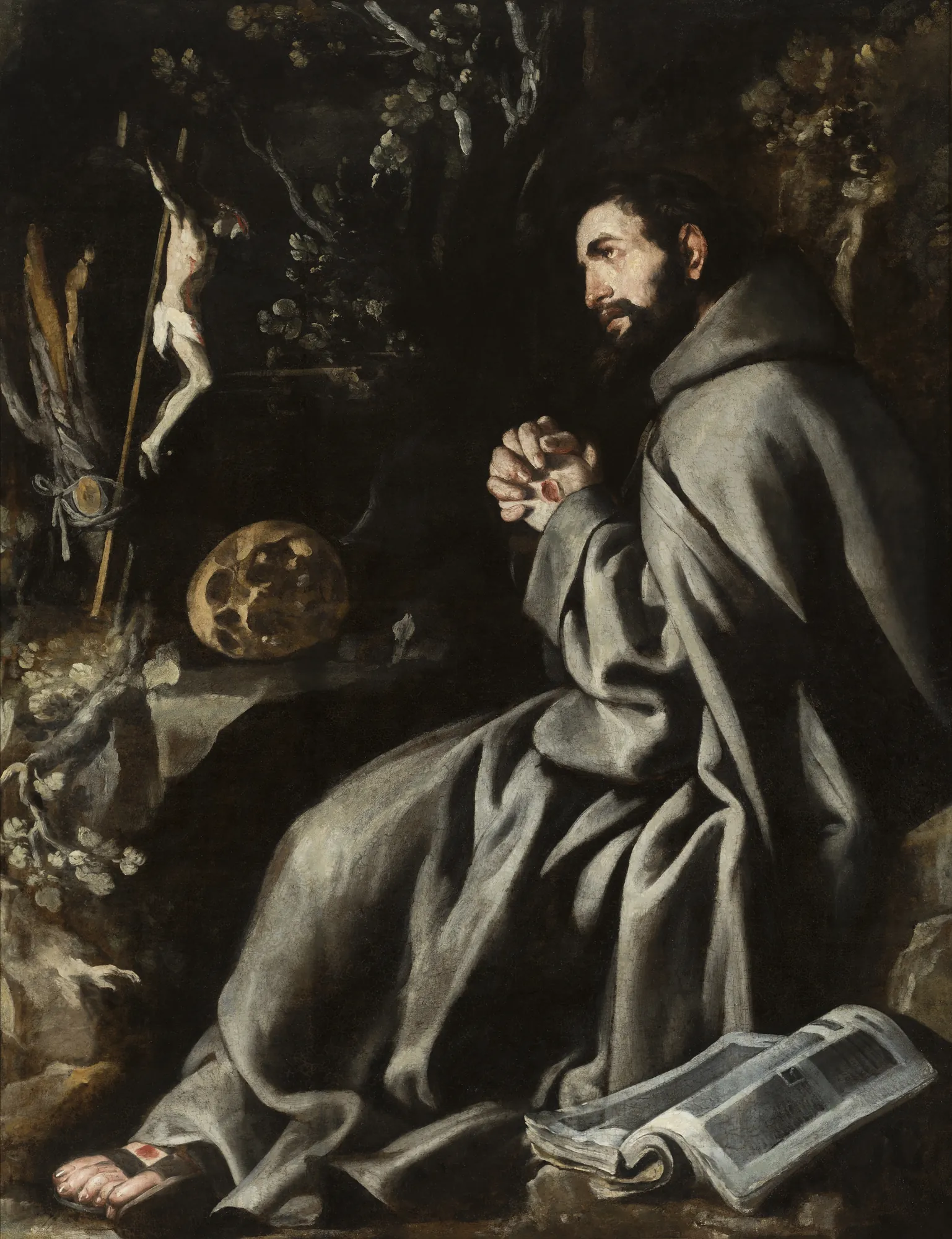 Saint Francis of Assisi Saint Francis of Assisi by Antonio del Castillo y Saavedra. A bearded saint in a brown habit is depicted in profile, kneeling in prayer before a crucifix and a skull in a dark, rocky setting.