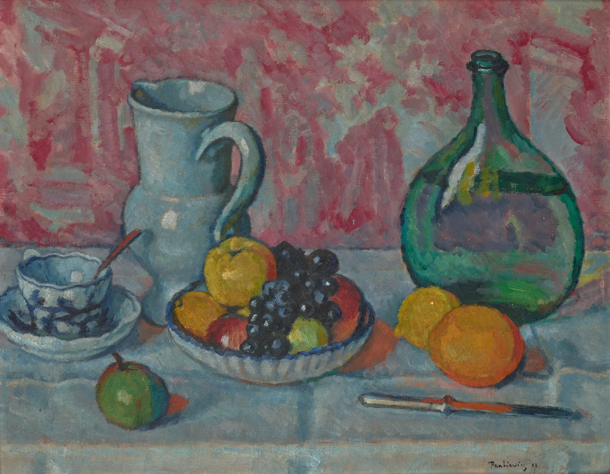 Still Life with a Knife Still Life with a Knife by Józef Pankiewicz. A vibrant Post-Impressionist still life featuring a pitcher, glass bottle, and bowl of fruit on a tabletop against a patterned pink background.