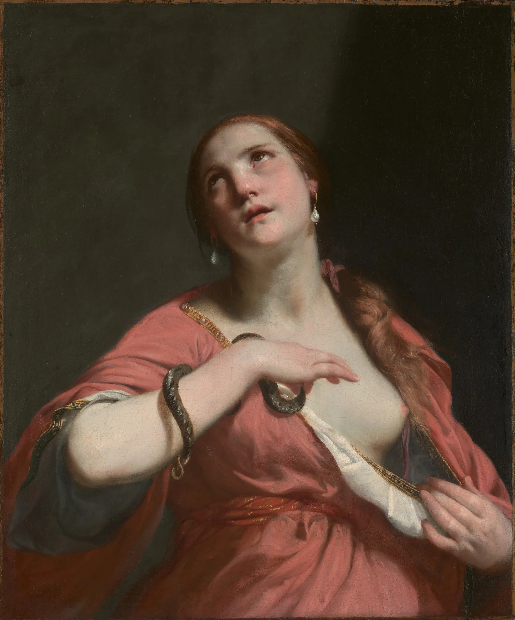 The Death of Cleopatra The Death of Cleopatra by Guido Cagnacci. A dramatic portrait of Cleopatra in a pink gown, looking skyward with an asp coiled around her arm.