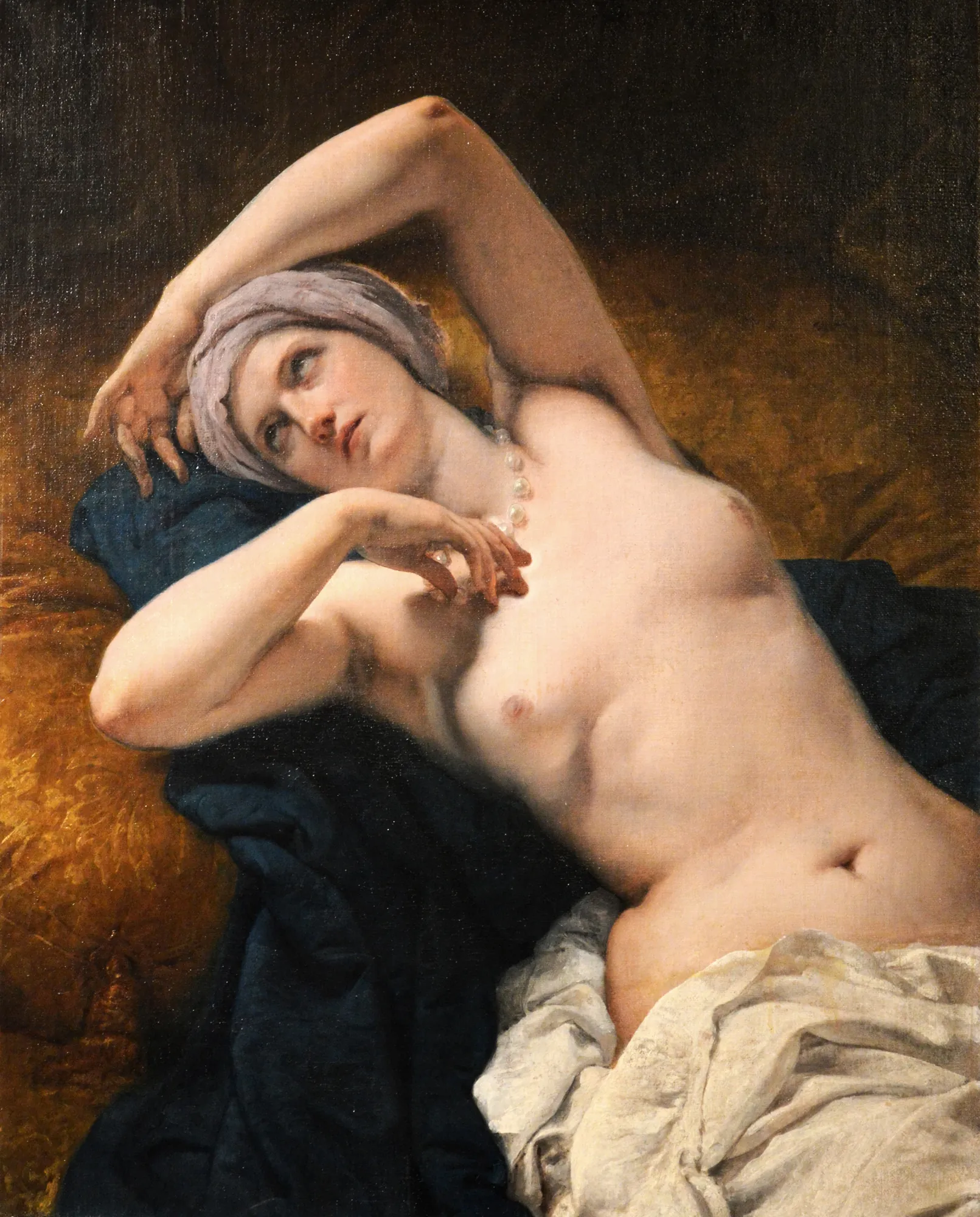 Odalisque in Her Sleep Odalisque in Her Sleep by Francesco Hayez. A reclining nude woman wearing a lavender turban and pearls rests against deep blue and gold cushions.