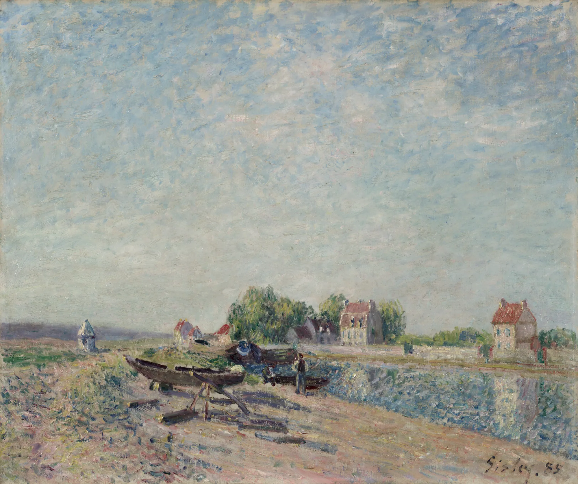 Saint-Mammès, Loing Canal Saint-Mammès, Loing Canal by Alfred Sisley. An impressionist river scene featuring a wide sky, a canal bank with docked boats, and a small cluster of houses in the distance.