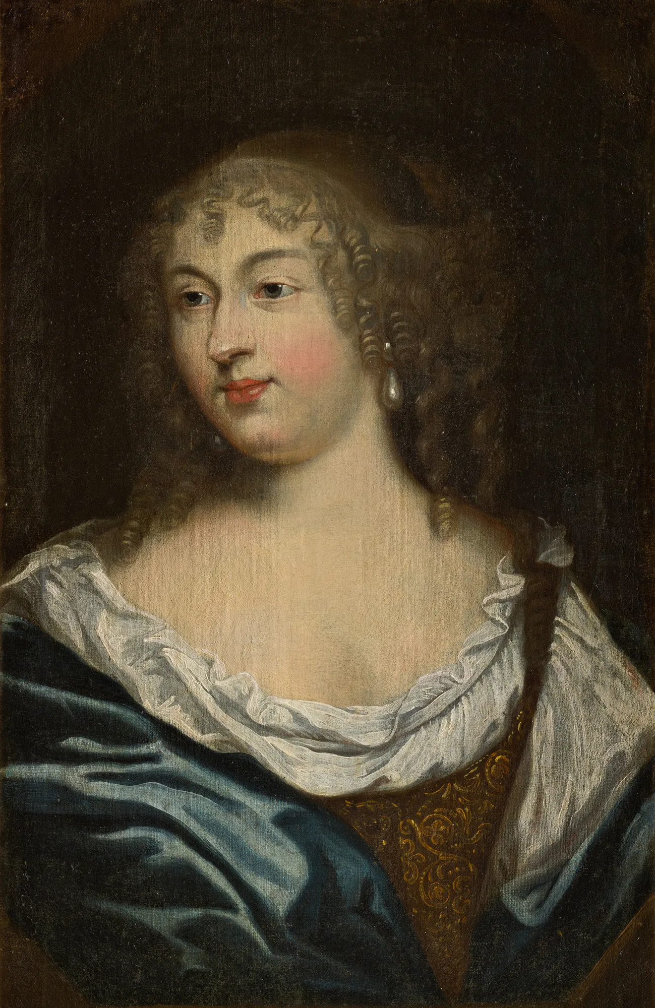 Françoise-Marguerite de Sévigné, Comtesse de Grignan Françoise-Marguerite de Sévigné, Comtesse de Grignan by Unknown Artist. A classical oil portrait of a noblewoman with light-colored curls and a pearl earring, wearing a white chemise and blue wrap.