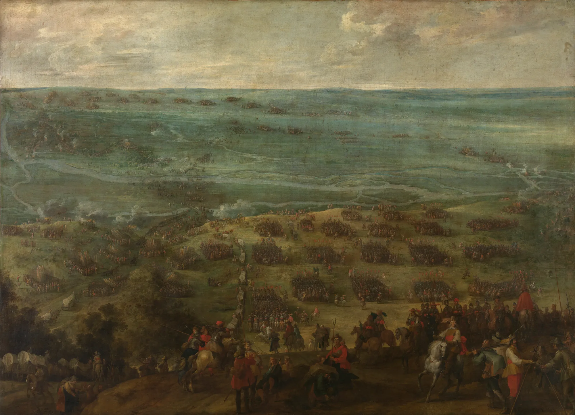 Crossing the Somme in Cérisy Crossing the Somme in Cérisy by Peter Snayers. An expansive panoramic landscape showing thousands of soldiers and cavalry troops crossing a river valley under an overcast sky.