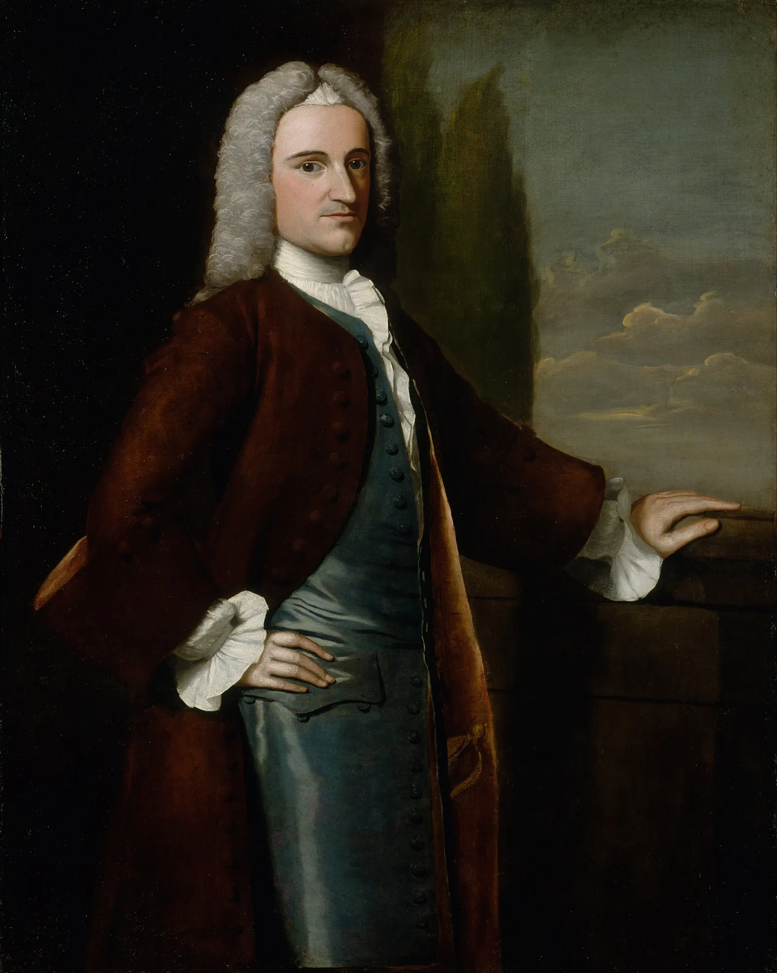Thomas Hopkinson Thomas Hopkinson by Robert Feke. A waist-up oil portrait of a man in a powdered wig, brown coat, and blue waistcoat, standing against a background of sky and trees.