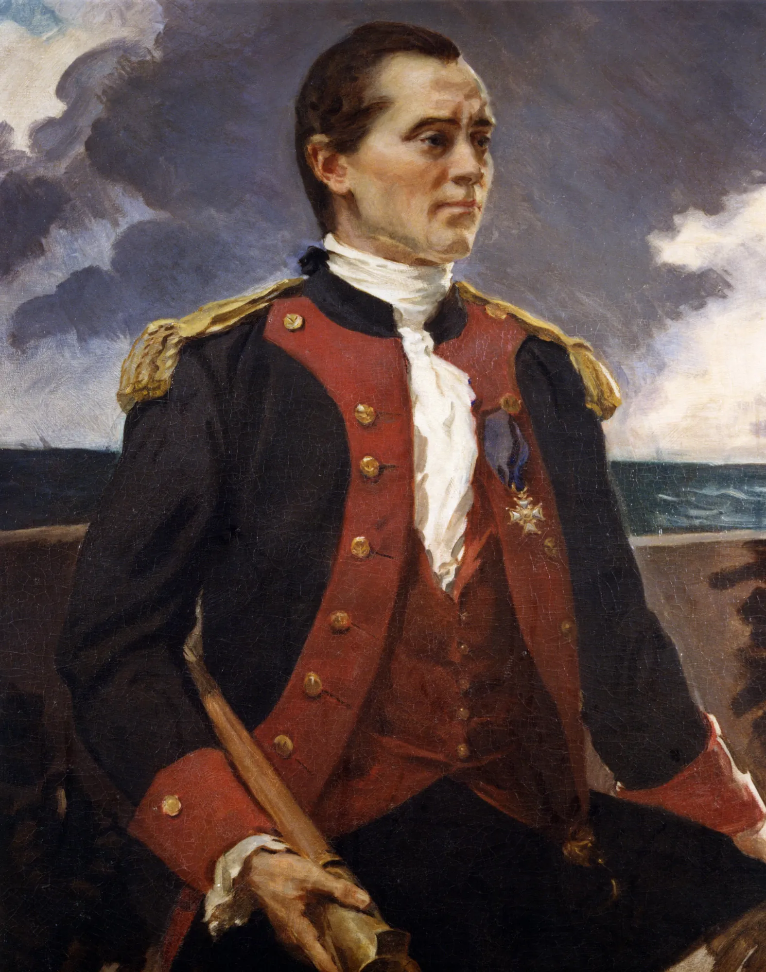 Captain John Paul Jones Captain John Paul Jones by Cecilia Beaux. A heroic portrait of a naval officer in a dark blue and red uniform with gold epaulettes, set against a stormy, clouded sky over the sea.