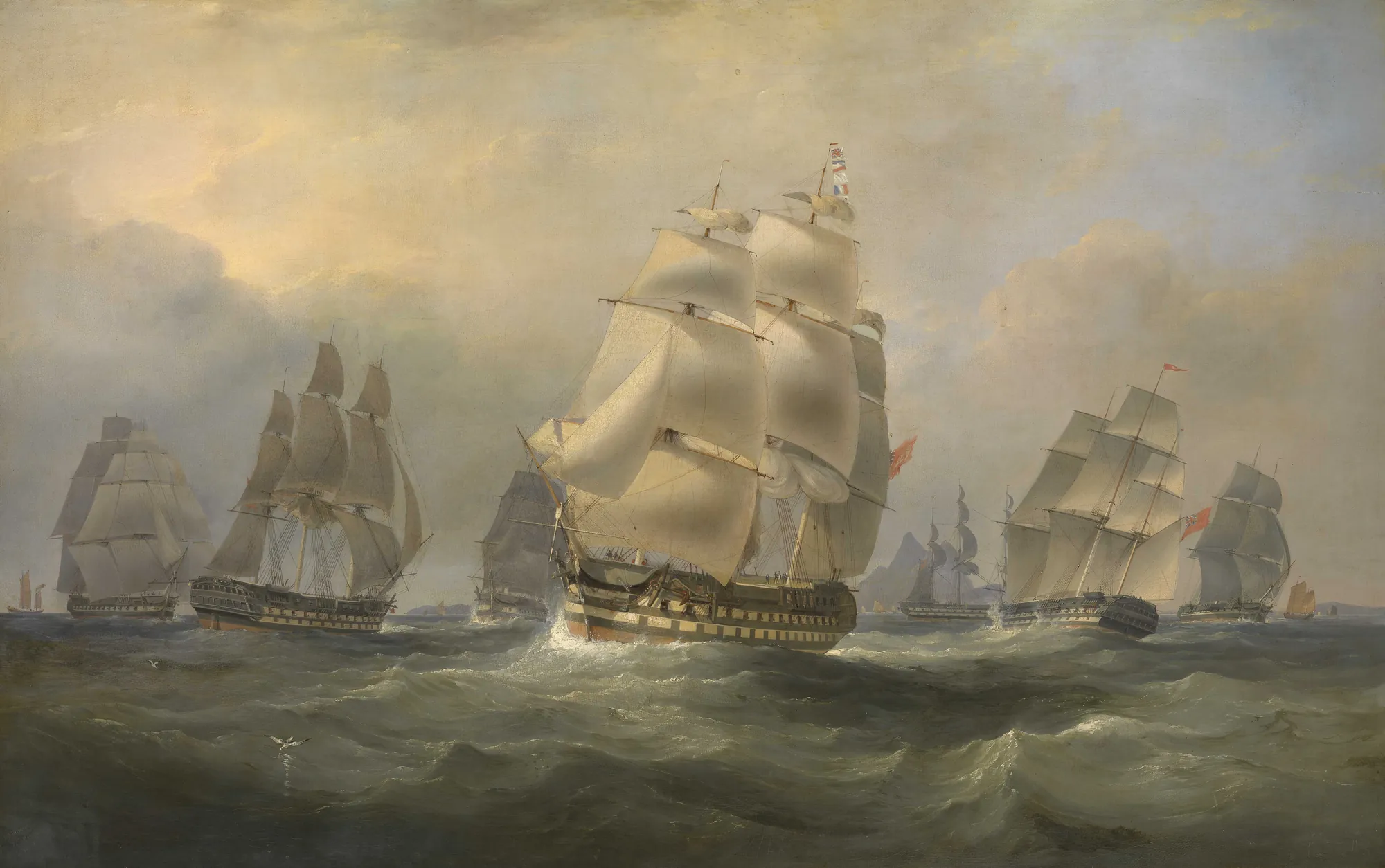 East Indiamen in the China Seas East Indiamen in the China Seas by Edward Duncan. A group of large sailing ships navigate choppy, grey-green waters under a cloudy, golden sky.