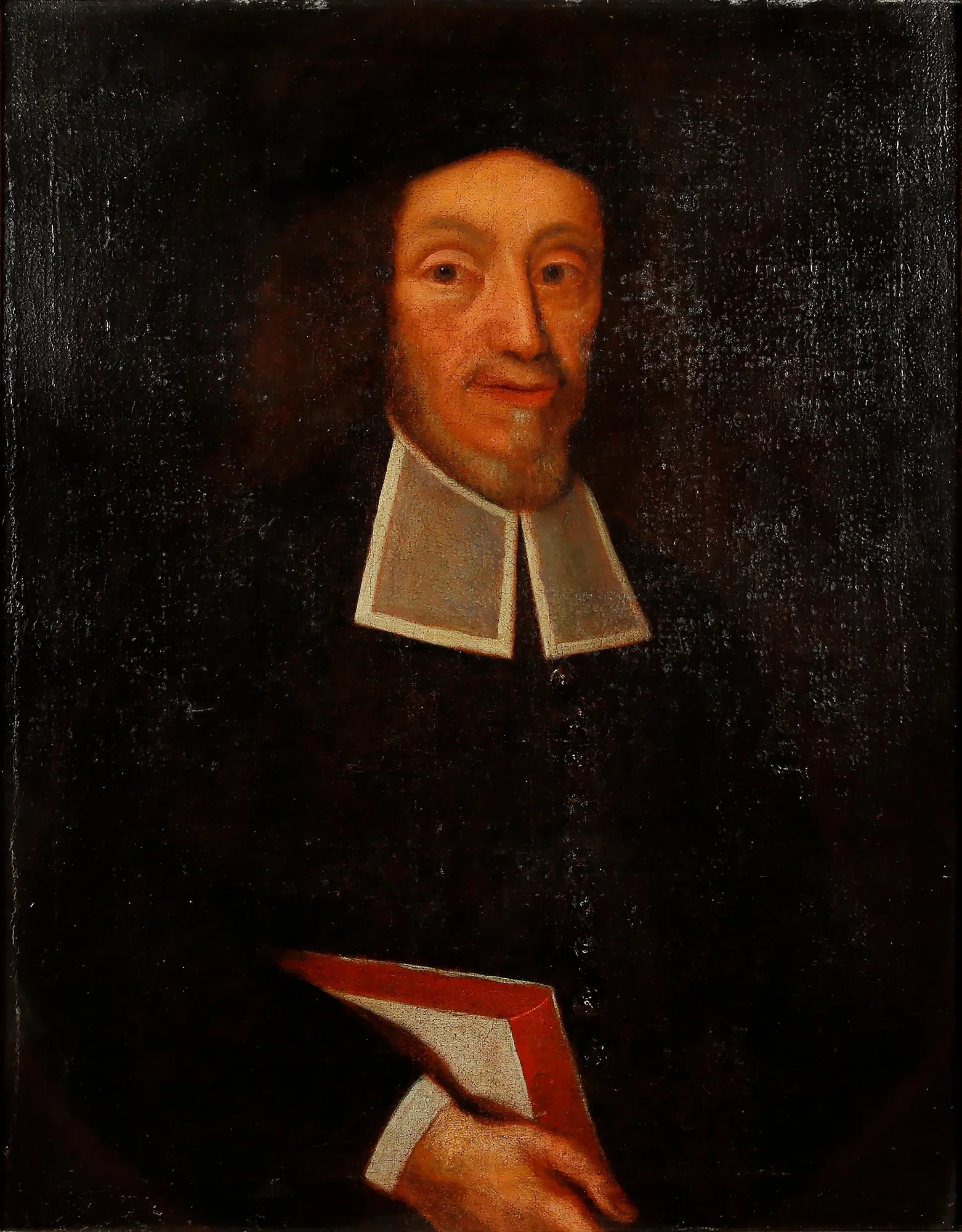 Portrait of Jens Hals Portrait of Jens Hals by Unknown Artist. A seventeenth-century oil portrait of a man with long dark hair wearing a black clerical robe and a white collar while holding a red book.