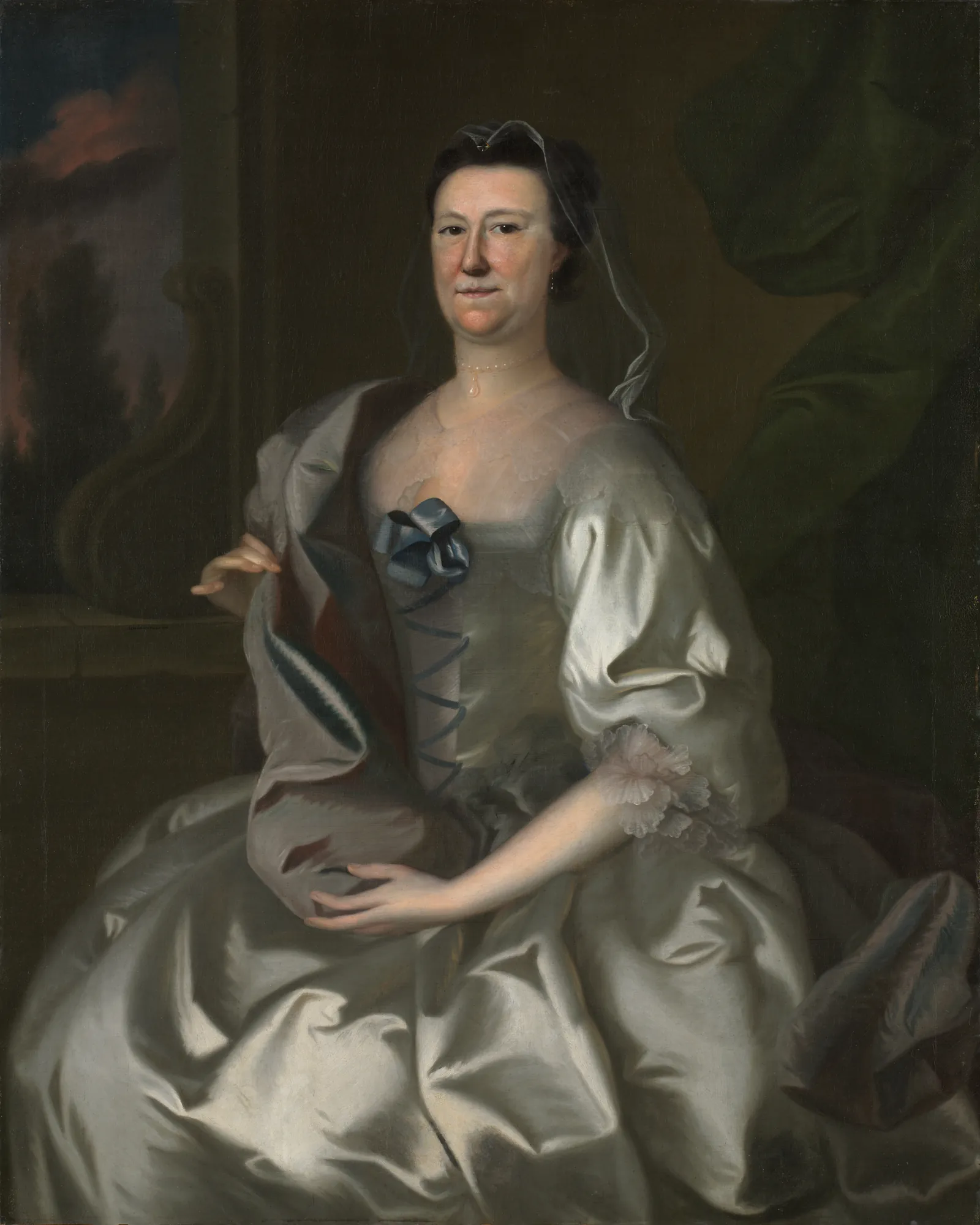 Hannah Wentworth Atkinson Hannah Wentworth Atkinson by Joseph Blackburn. A three-quarter length portrait of a woman in an elaborate white satin gown with blue ribbons and a sheer black veil, set against a dark architectural background.