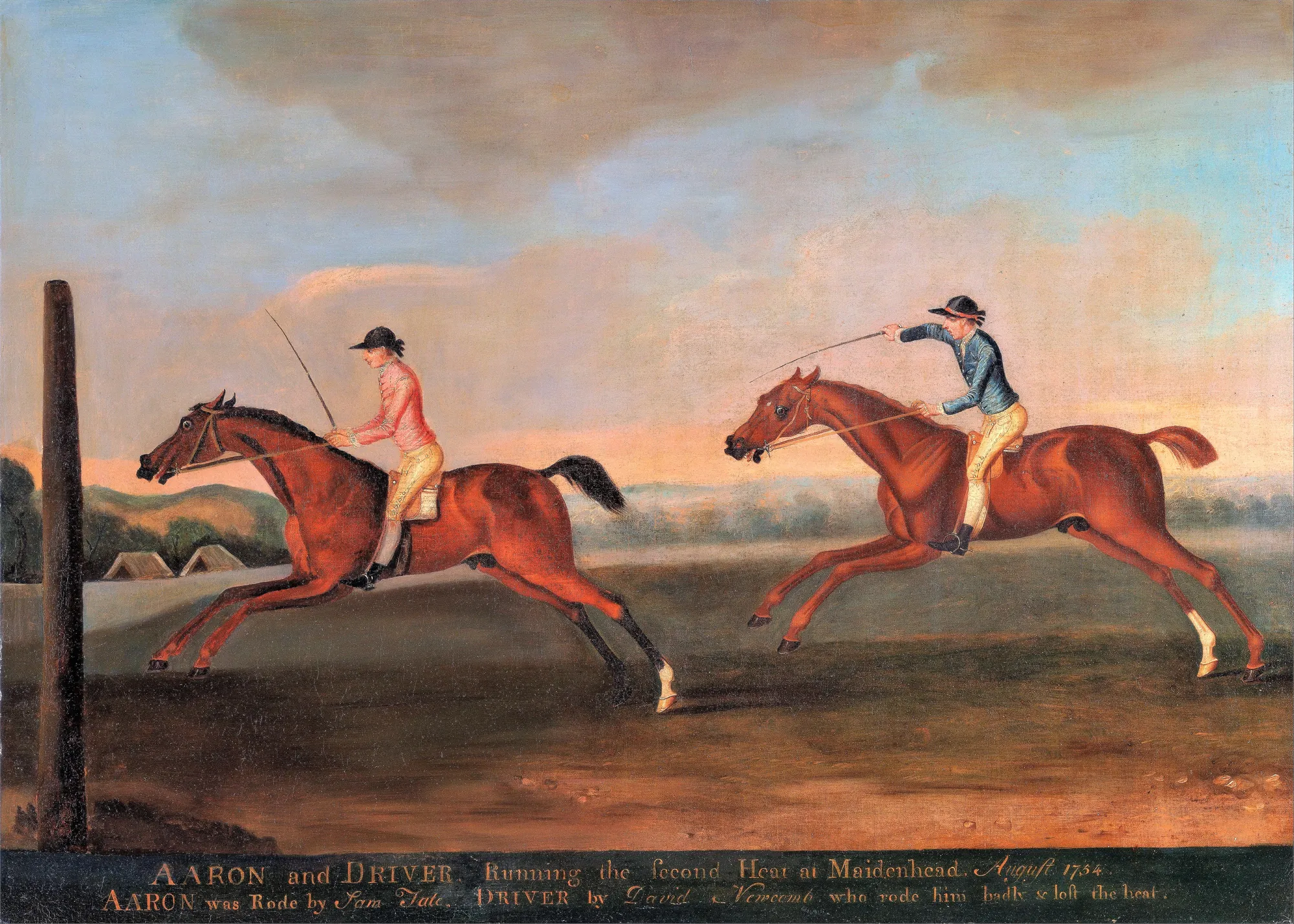 The Match Between Aaron and Driver at Maidenhead The Match Between Aaron and Driver at Maidenhead by Richard Roper. Two thoroughbred horses with jockeys in pink and blue jackets are depicted in full gallop during a race across a flat field.