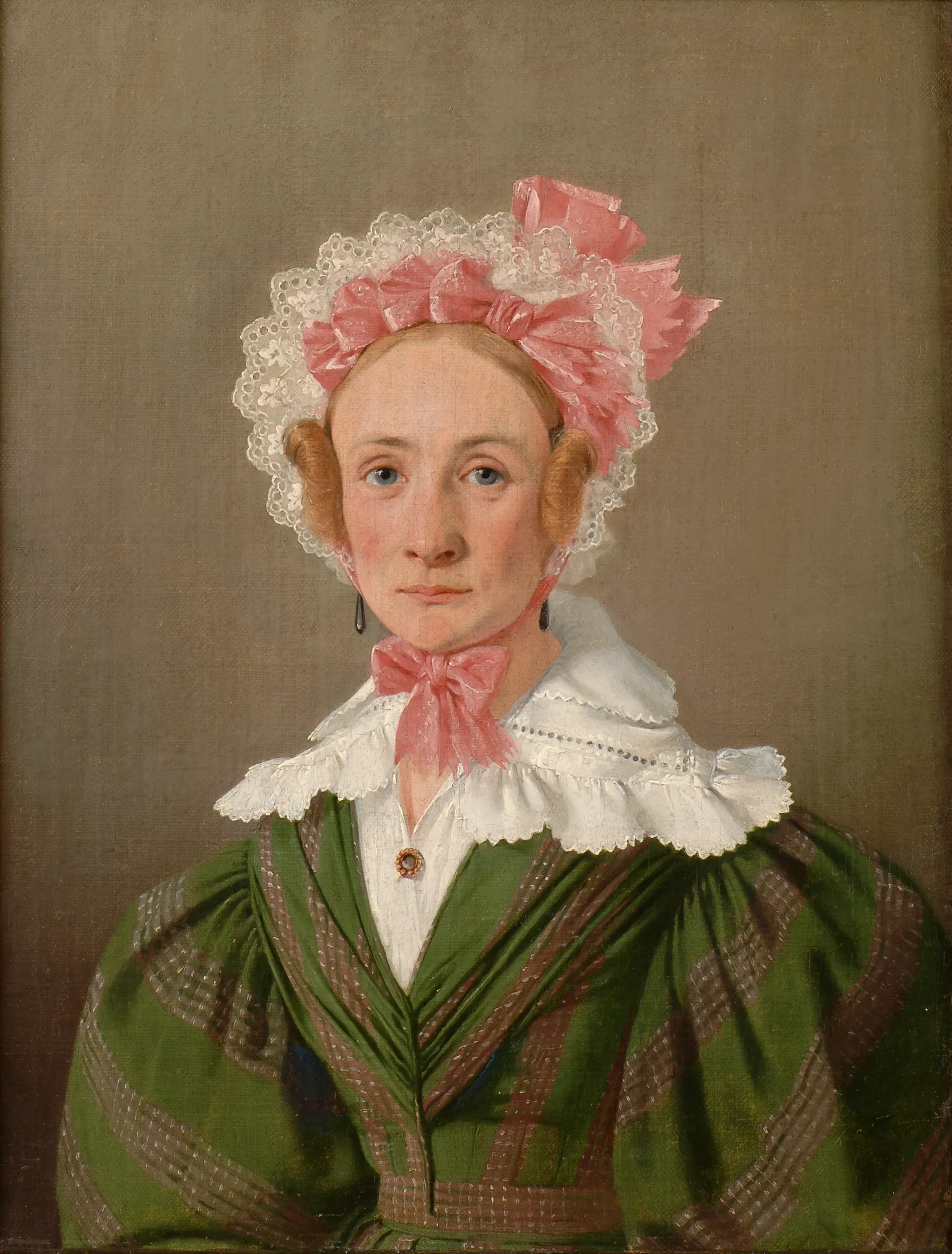 Miss Ida Wilhelmine Trock Miss Ida Wilhelmine Trock by Jørgen Roed. A waist-up portrait of a fair-skinned woman wearing an elaborate white lace bonnet adorned with pink silk bows and a green striped dress with a ruffled collar.