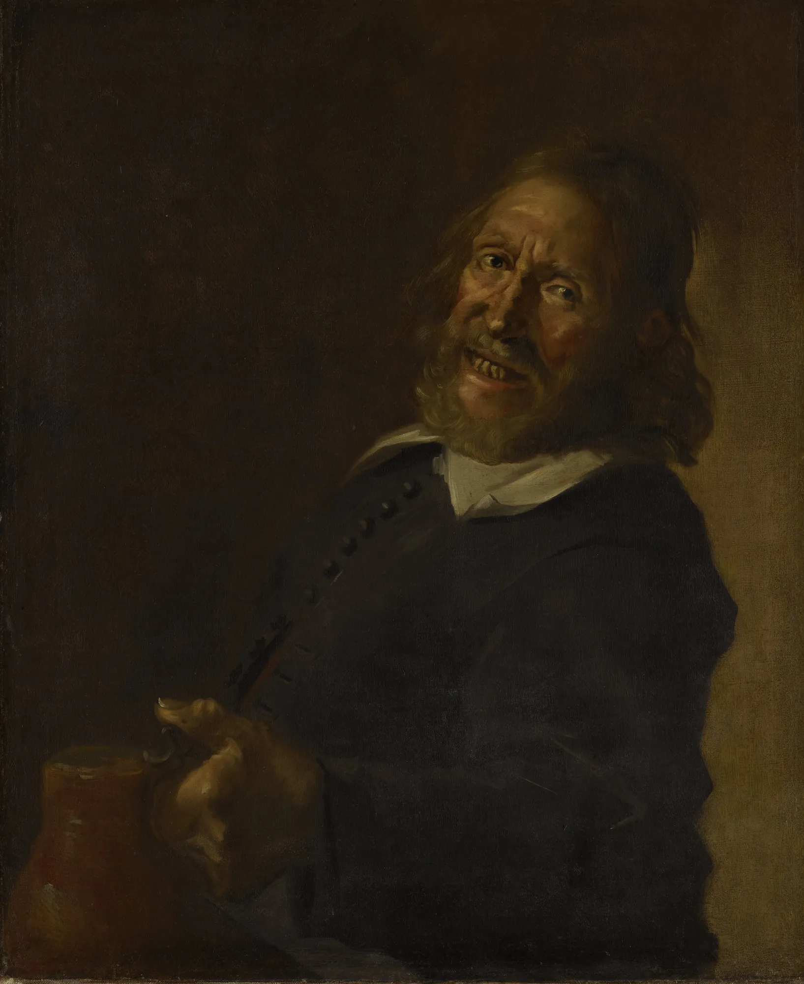 The Laughing Toper The Laughing Toper by Frans Hals. An expressive oil portrait of a bearded man laughing while holding a ceramic jug against a dark, atmospheric background.