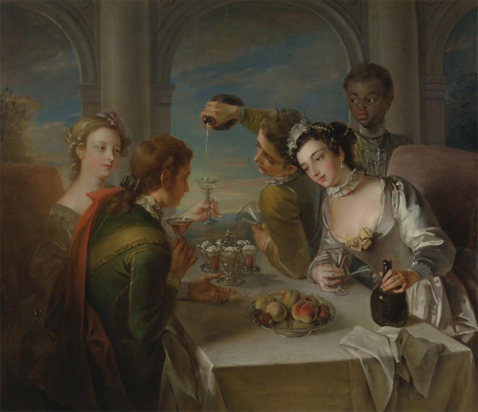 The Sense of Taste The Sense of Taste by Philippe Mercier. A group of elegantly dressed 18th-century men and women gather around a table, enjoying wine and fruit under a stone portico at dusk.