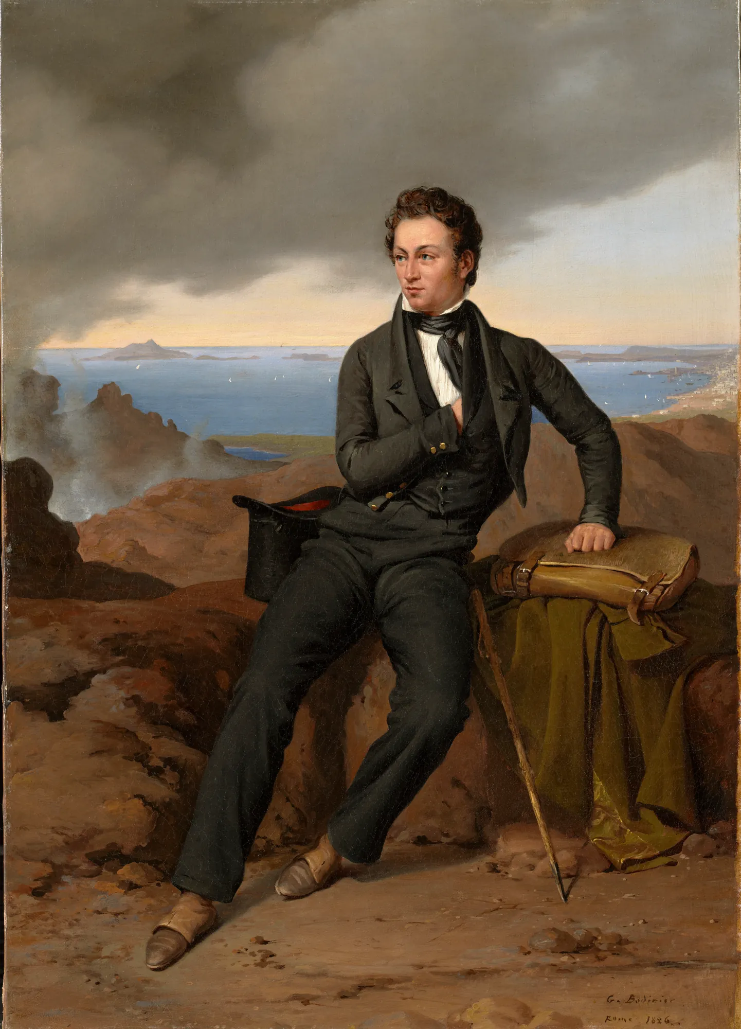Théodore Jubin Théodore Jubin by Guillaume Bodinier. A portrait of a young man in a dark suit sitting on a rocky ledge overlooking a coastal bay under a stormy sky.