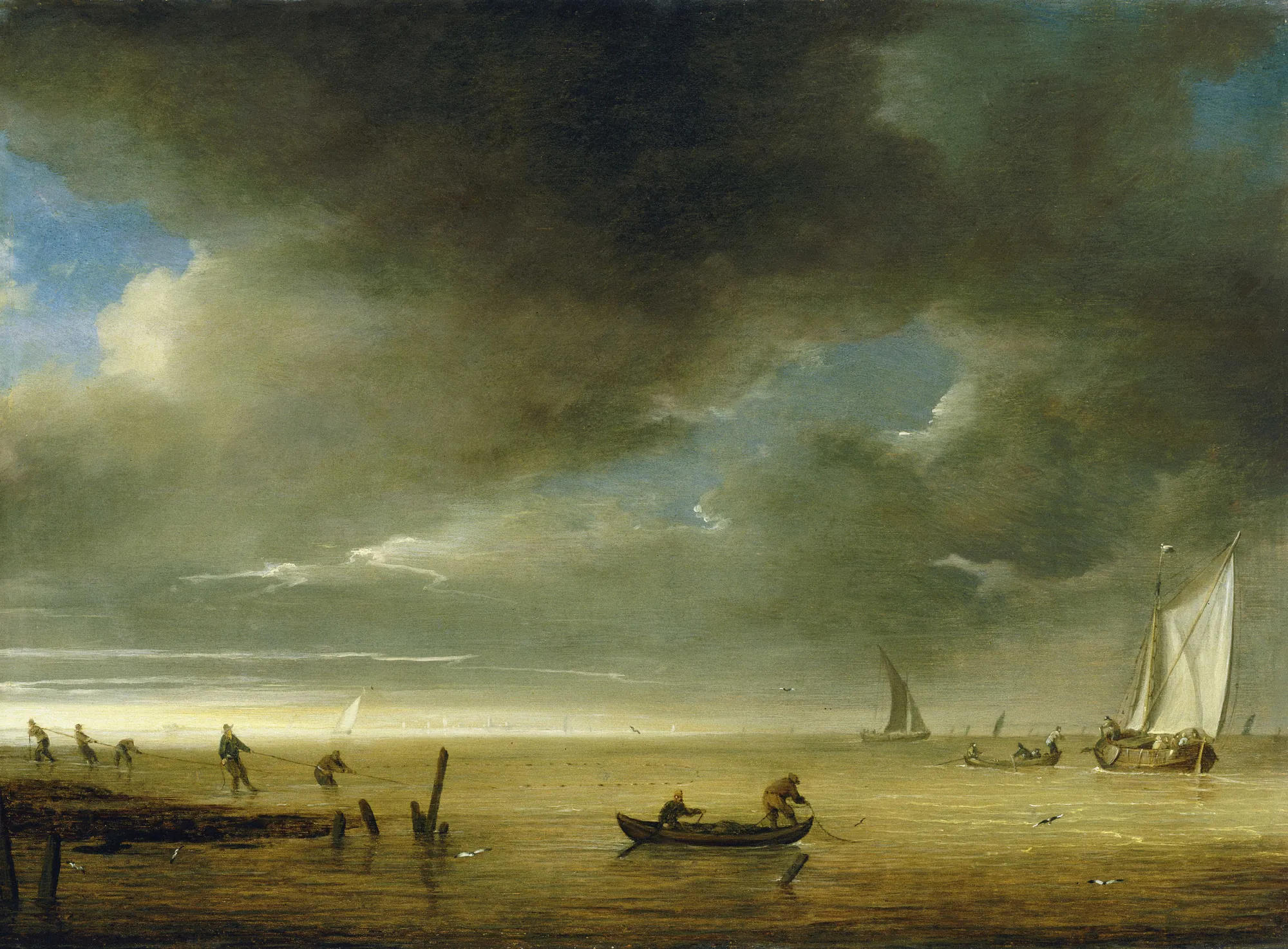 Fishermen on Shore Hauling in Their Nets Fishermen on Shore Hauling in Their Nets by Julius Porcellis. Fishermen toil on a dark shoreline, hauling in nets under a vast and moody sky filled with heavy clouds and patches of light.
