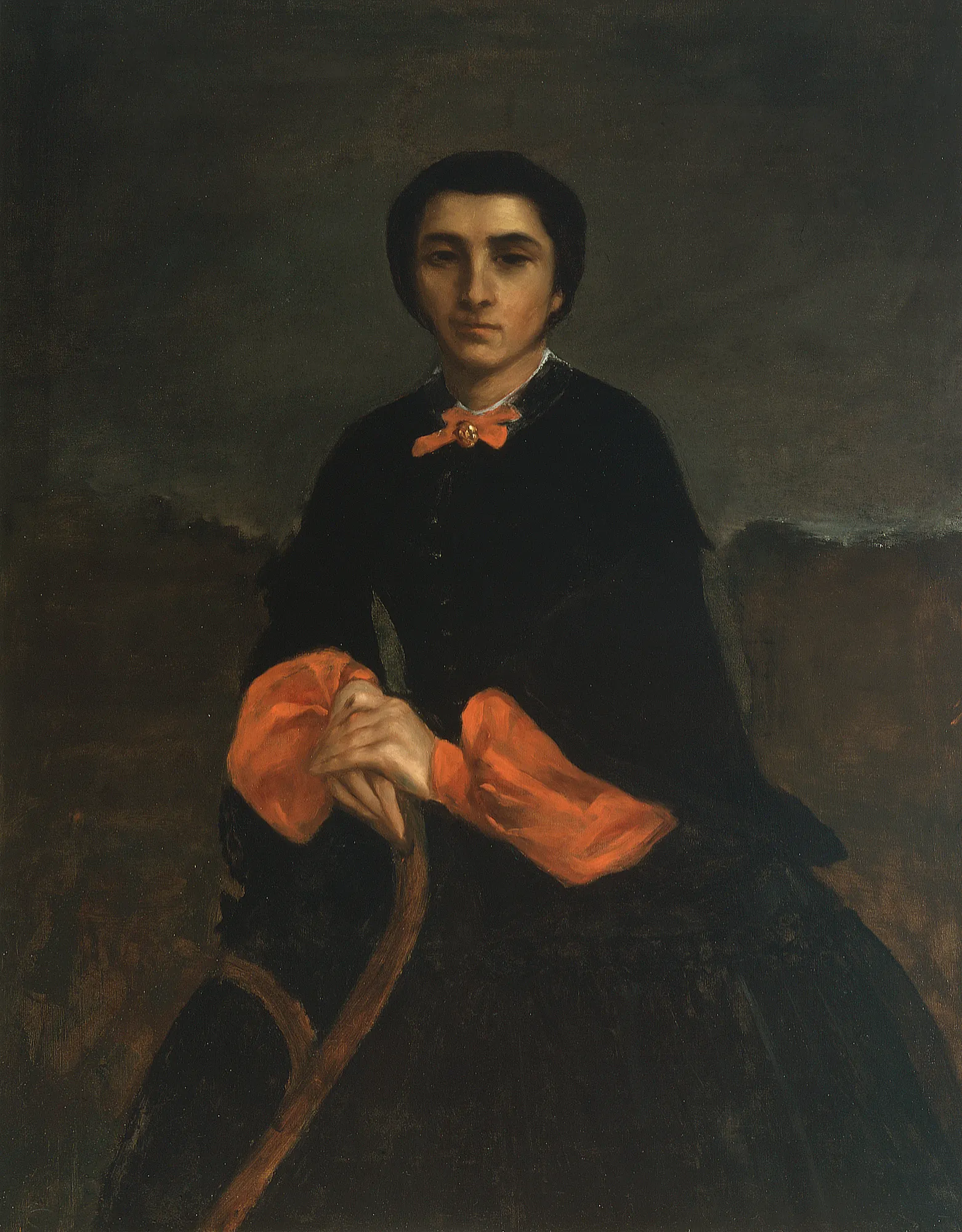 Portrait of Juliette Courbet Portrait of Juliette Courbet by Gustave Courbet. A seated portrait of a woman in a black dress with vibrant orange cuffs and a bow, set against a dark, atmospheric background.
