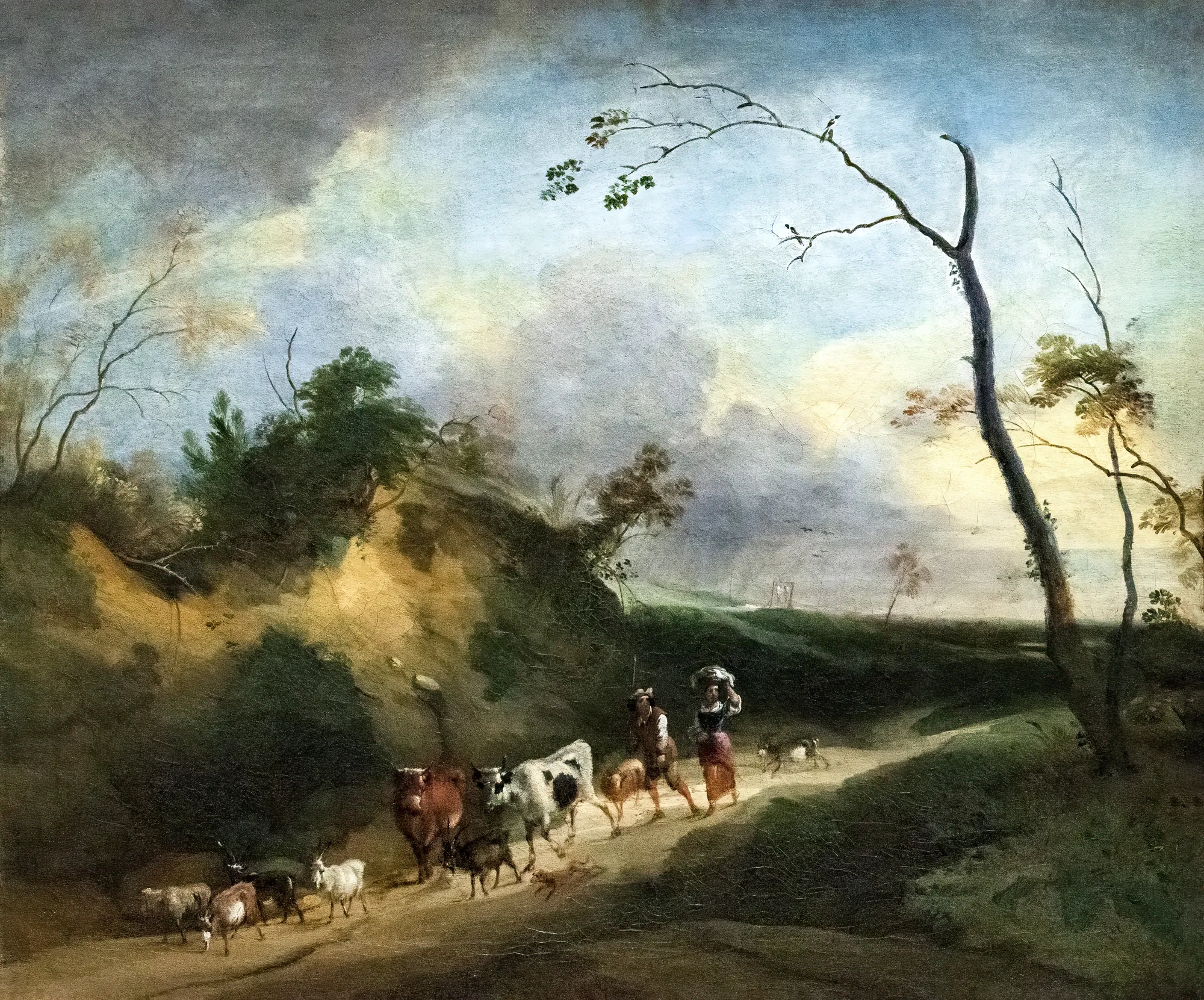 Landscape with Figures and Animals Landscape with Figures and Animals by Lodewijk de Vadder. A 17th-century pastoral scene showing a group of peasants herding cattle and goats along a sunlit path beneath a cloudy sky.