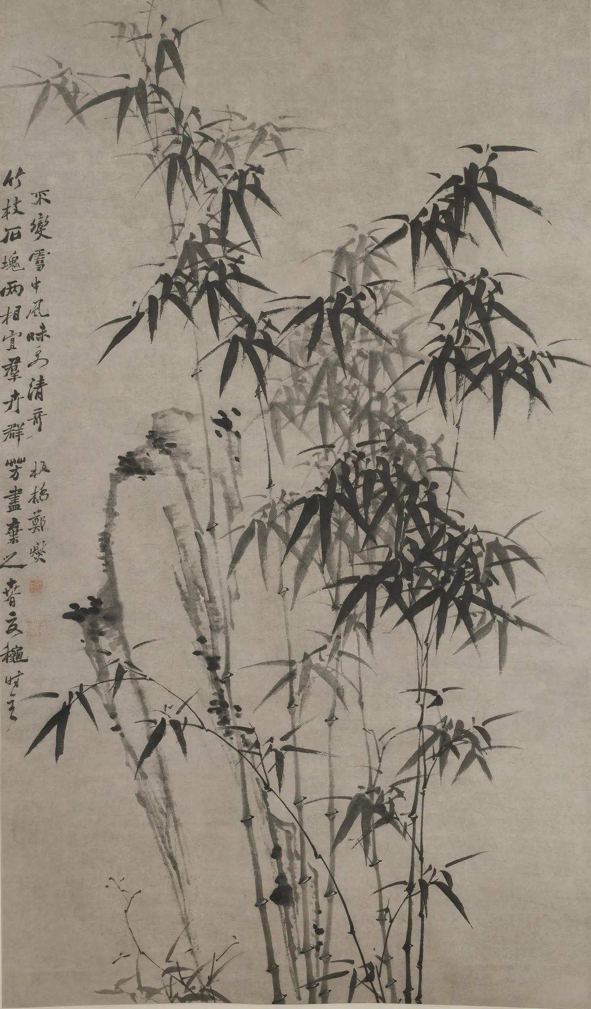 Bamboo and Rocks Bamboo and Rocks by Zheng Xie. A refined ink wash painting of bamboo stalks and leaves set against vertical rock formations, accompanied by elegant calligraphy.