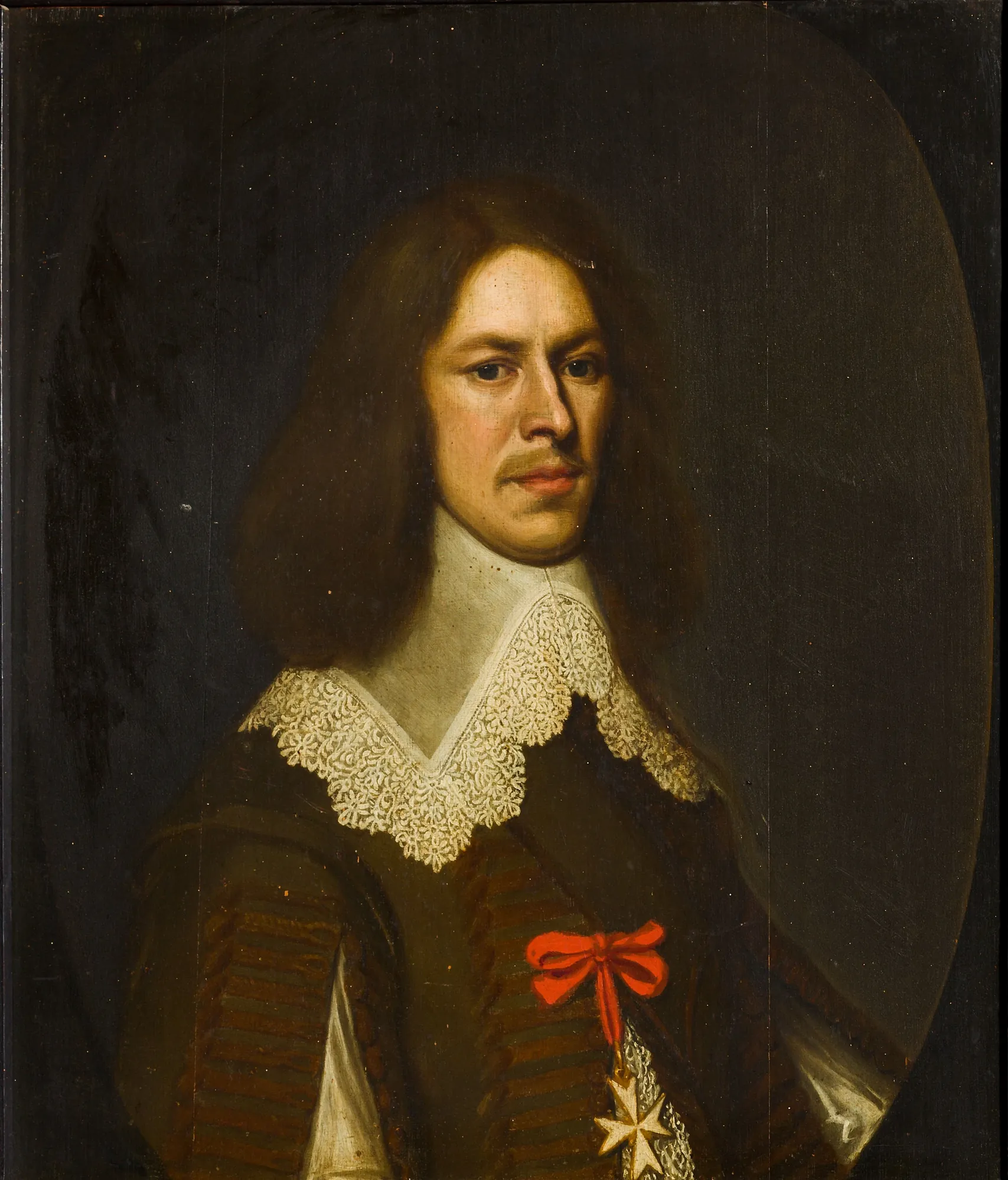 Portrait of Walraven Scheiffart von Merode Portrait of Walraven Scheiffart von Merode by Nicolaes de Helt Stockade. A waist-length portrait of a man with long hair and a prominent lace collar, set against a dark background within a painted oval border.