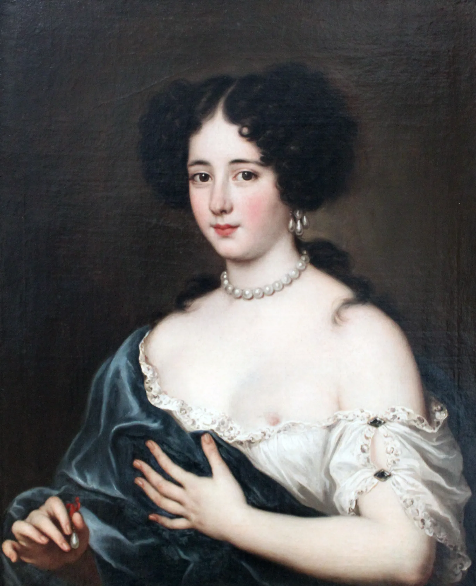 Clelia Cesarini Colonna as Cleopatra Clelia Cesarini Colonna as Cleopatra by Jacob Ferdinand Voet. A 17th-century portrait of a dark-haired noblewoman wearing pearls and a blue silk cloak, depicted as the historical Cleopatra.