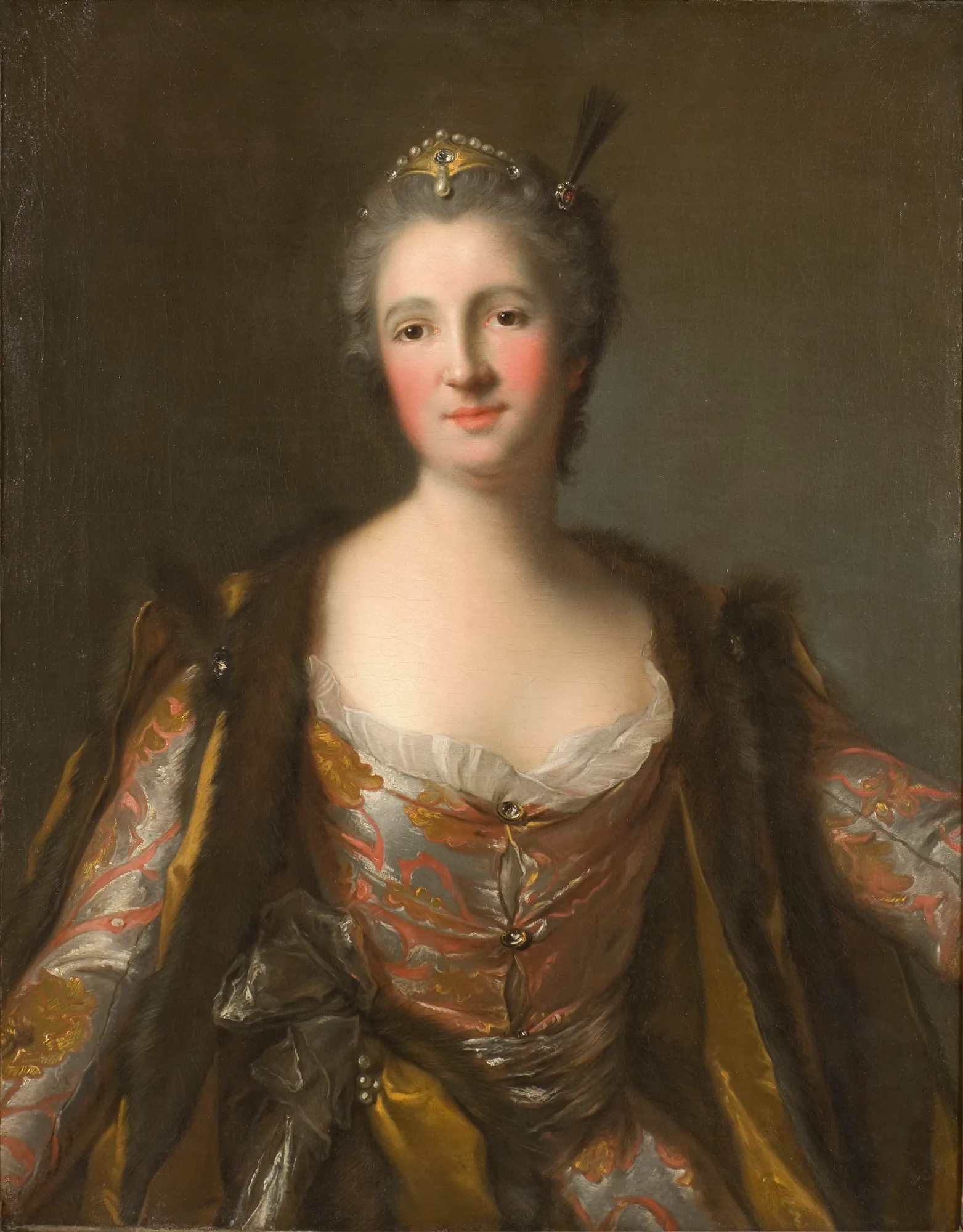 Marquise de Broglie as Sultana Marquise de Broglie as Sultana by Jean-Marc Nattier. A three-quarter length portrait of a noblewoman in an exotic, fur-lined gown and jeweled headpiece against a dark, neutral background.