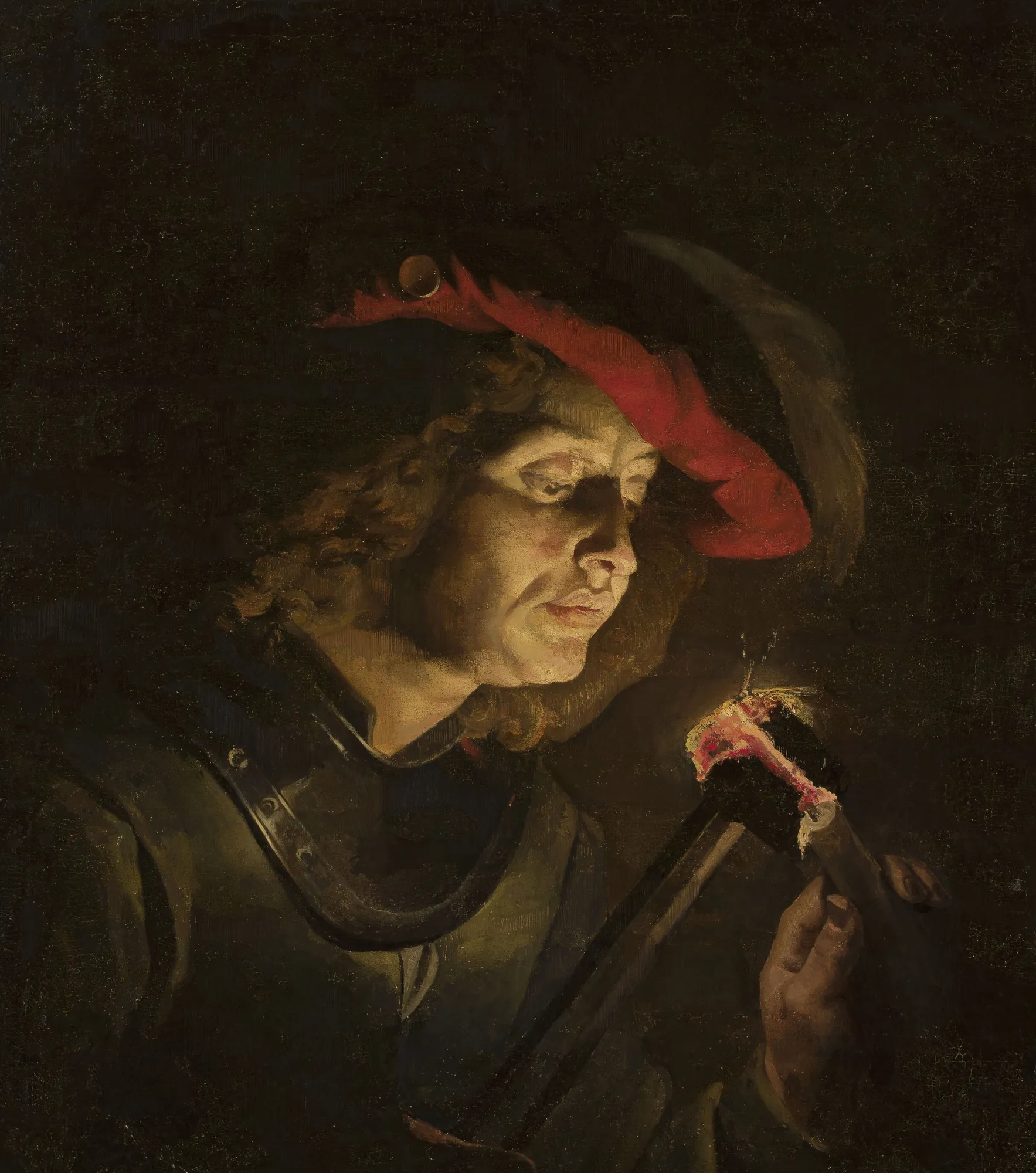 Soldier Lighting a Candle