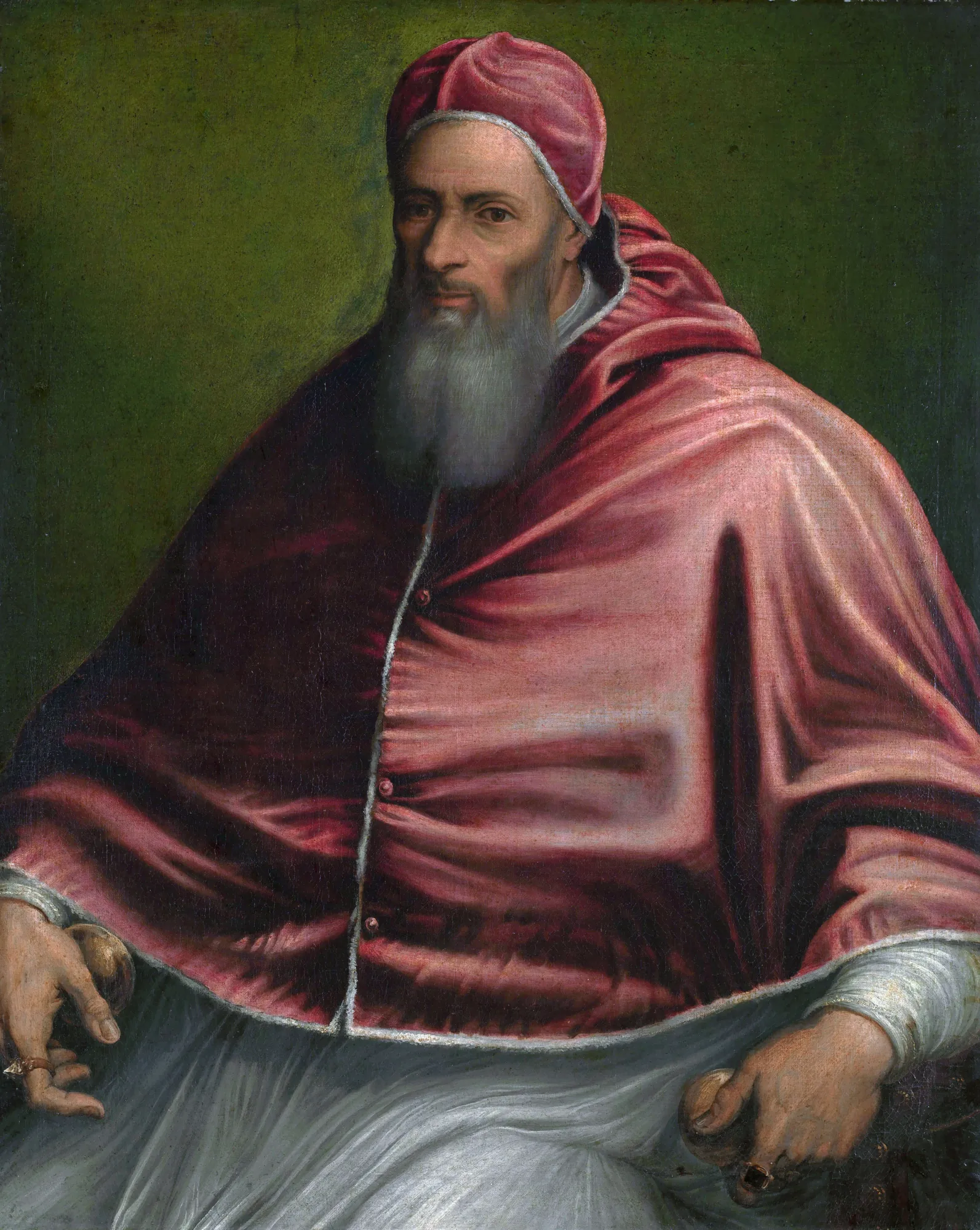 Pope Julius III Pope Julius III by Unknown Artist. A formal oil portrait of an elderly bearded man wearing a crimson clerical mozzetta and cap against a dark green background.