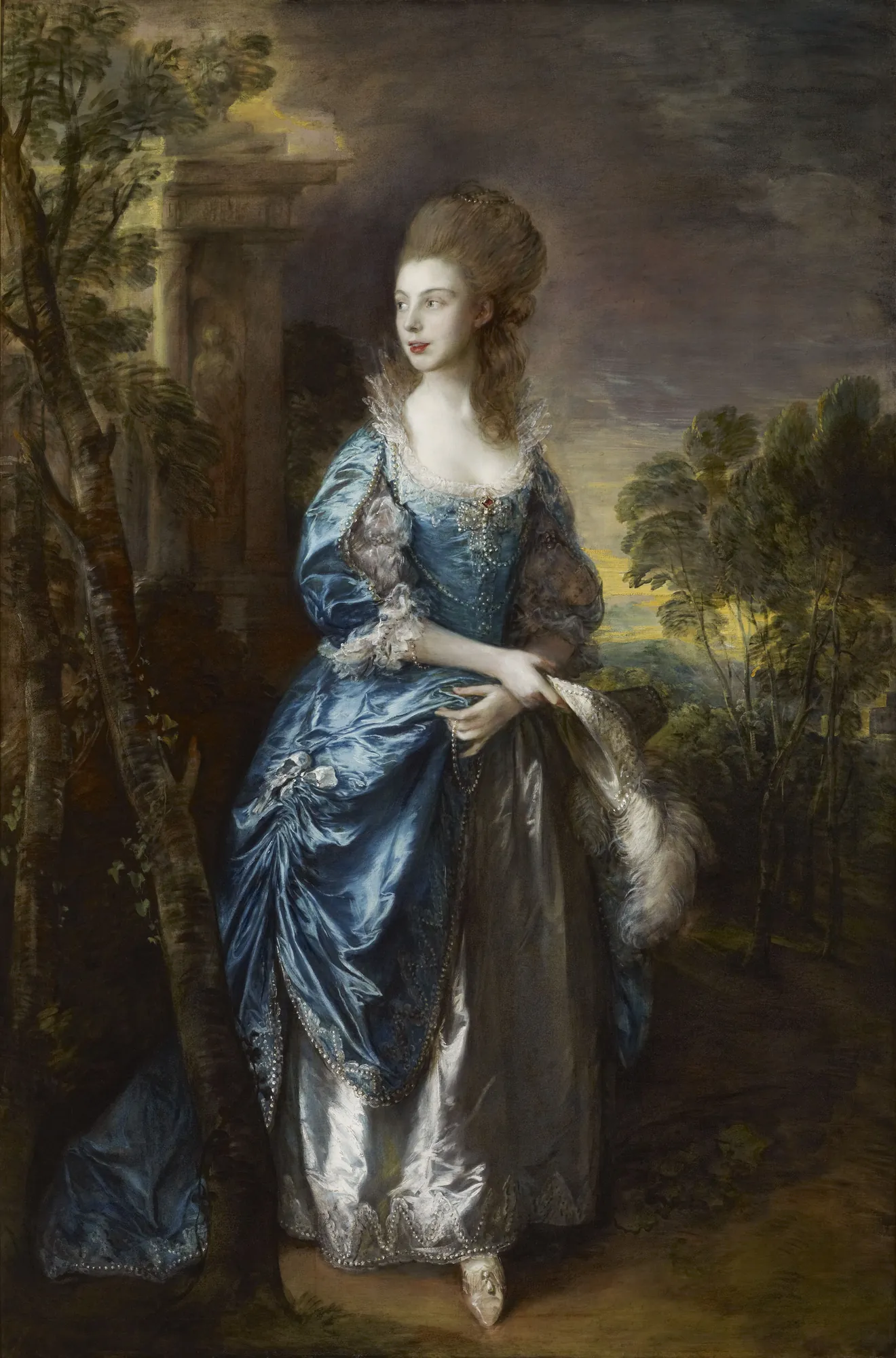 The Hon. Frances Duncombe The Hon. Frances Duncombe by Thomas Gainsborough. A full-length portrait of a young woman in an elaborate shimmering blue satin dress standing before a moody landscape and architectural elements.