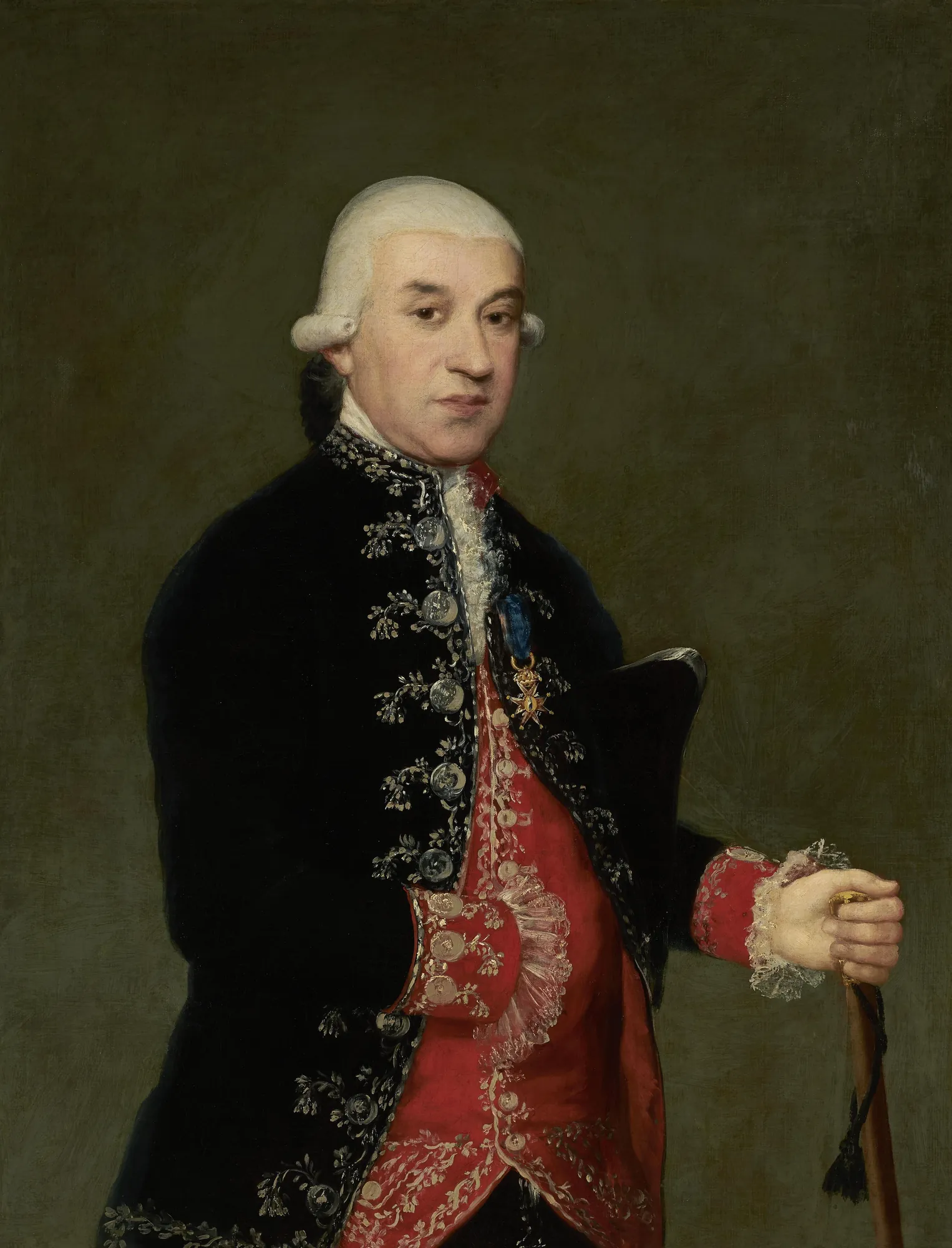 Portrait of Francisco Javier de Larumbe Portrait of Francisco Javier de Larumbe by Francisco Goya. A formal three-quarter length portrait of a man in an 18th-century powdered wig, black embroidered coat, and red vest.